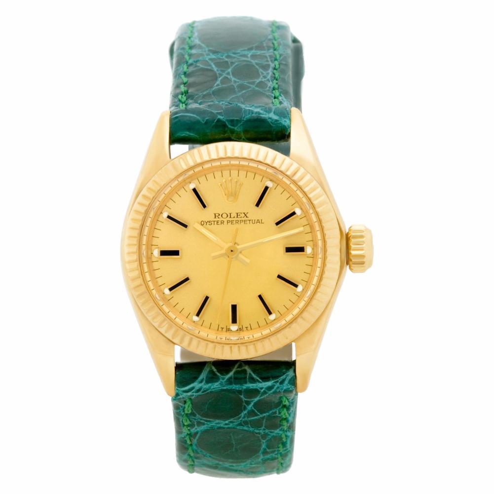 Rolex Oyster Perpetual Reference #:6719. Ladies Rolex Oyster Perpetual in 18k on leather strap. Auto w/ sweep seconds. Ref 6719. Circa 1979 Fine Pre-owned Rolex Watch. Certified preowned Rolex Oyster Perpetual 6719 watch is made out of yellow gold