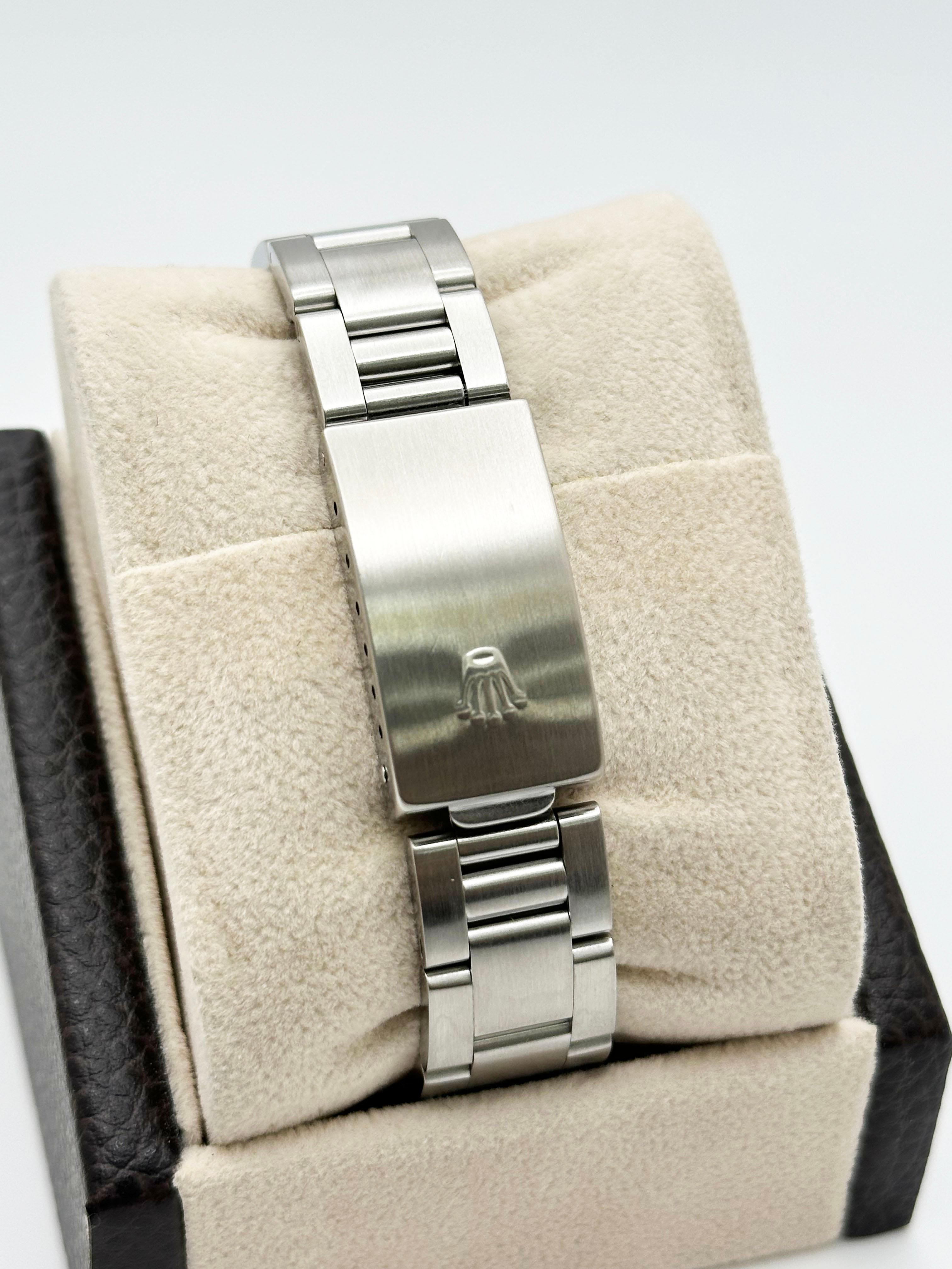 Rolex Oyster Perpetual 77014 Midsize 31mm Blaues Zifferblatt 18k Gold und Edelstahl für Damen oder Herren