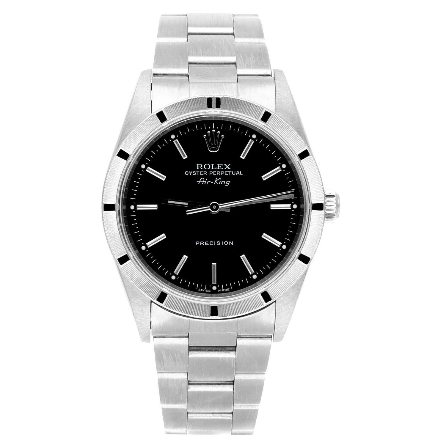 Rolex Air King 34mm Stainless Steel Watch Black Dial Engine Turned Bezel Unisex Watch 14010, Circa 2001 Y series.
This watch has been professionally polished, serviced and is in excellent overall condition. There are absolutely no visible scratches