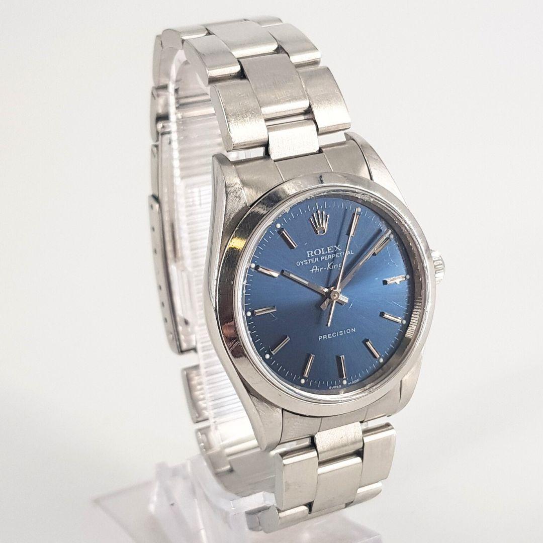 Exquisite
GENDER:  Unisex
MOVEMENT: Automatic
CASE MATERIAL: Steel 
DIAL: 34mm
DIAL COLOUR: Blue
STRAP:  55mm
BRACELET MATERIAL: Steel
CONDITION: 10/10 
MODEL NUMBER: 14000
SERIAL NUMBER: U988332
YEAR: 1999
BOX – Yes
PAPERS – Yes
