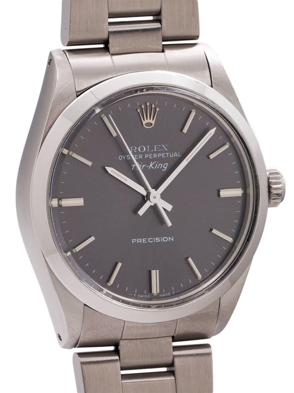 
An especially attractive and fine condition Rolex stainless steel Oyster Perpetual Airking ref 5500 serial #L9 million circa 1988. Featuring a 34mm diameter Oyster case with smooth bezel and acrylic crystal. With original metallic gray dial with