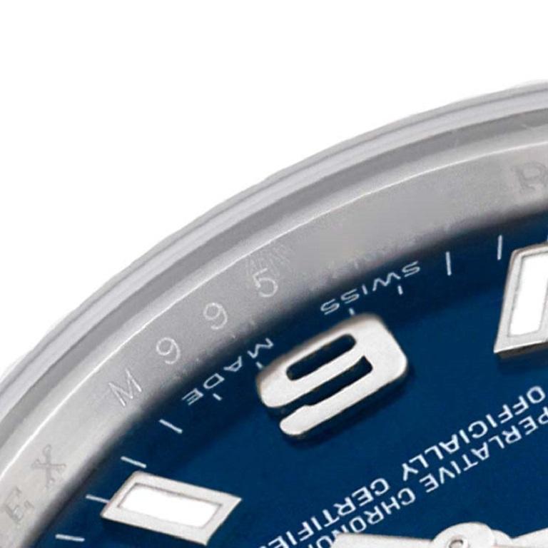 Rolex Oyster Perpetual Ladies Watch 176234, cadran bleu, acier et or blanc. Mouvement automatique à remontage automatique, officiellement certifié chronomètre. Boîtier oyster en acier inoxydable de 26.0 mm de diamètre. Logo Rolex sur une couronne.