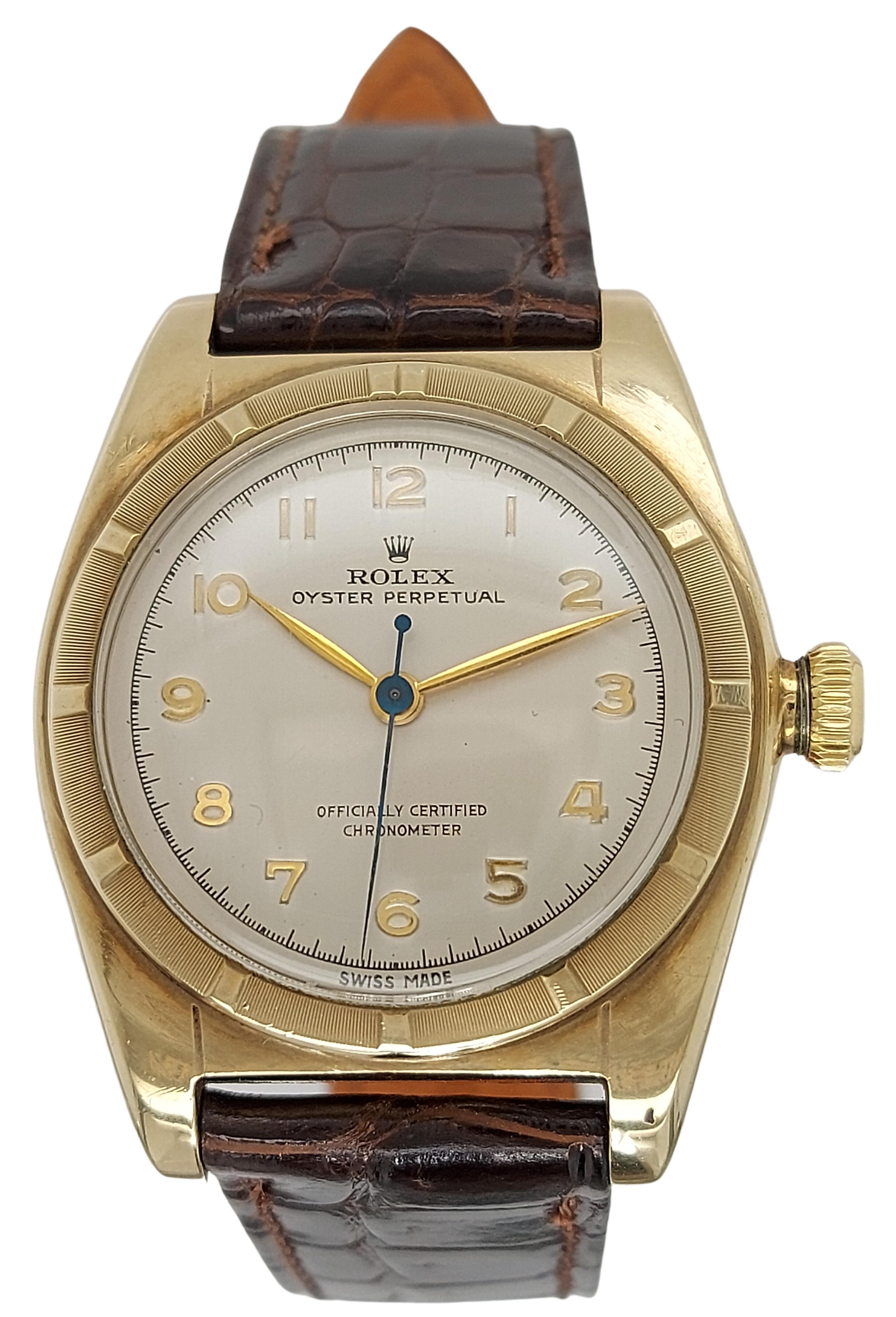 Rolex Oyster Perpetual Bubble Back Reference 5011, Automatic

Reference: 5011

Movement: Automatic

Functions: Hours, Minutes, Seconds

Case: 33mm Stainless Steel & Gold plated

Dial: Champagne/Silver dial with applied yellow gold arabic numerals