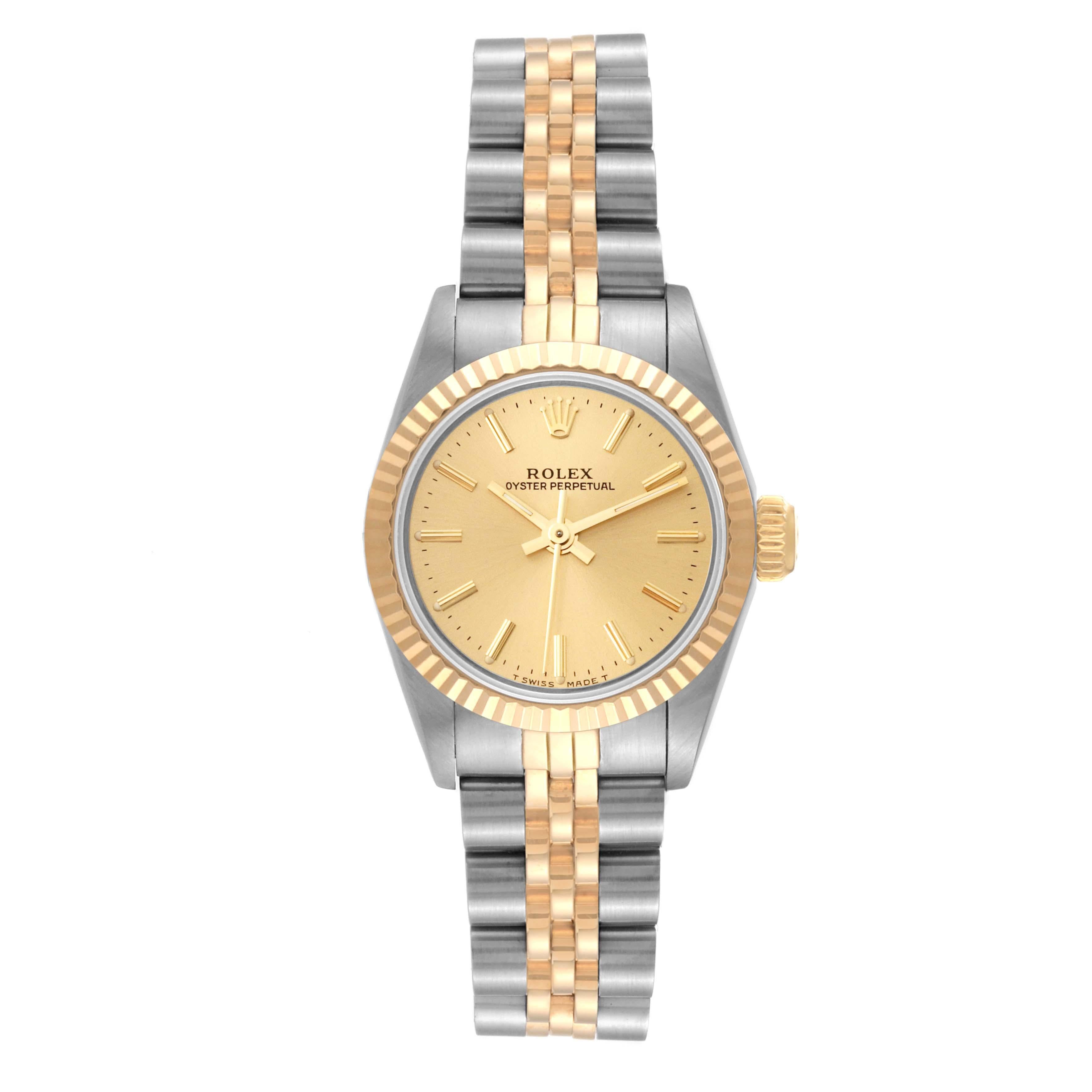 Rolex Oyster Perpetual Champagne Dial Steel Yellow Gold Ladies Watch 67193. Officially certified chronometer automatic self-winding movement. Stainless steel oyster case 24.0 mm in diameter. Rolex logo on an 18k yellow gold crown. 18k yellow gold