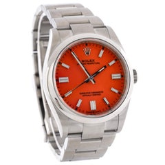 Rolex Oyster Perpetual Montre automatique rouge corail en acier inoxydable