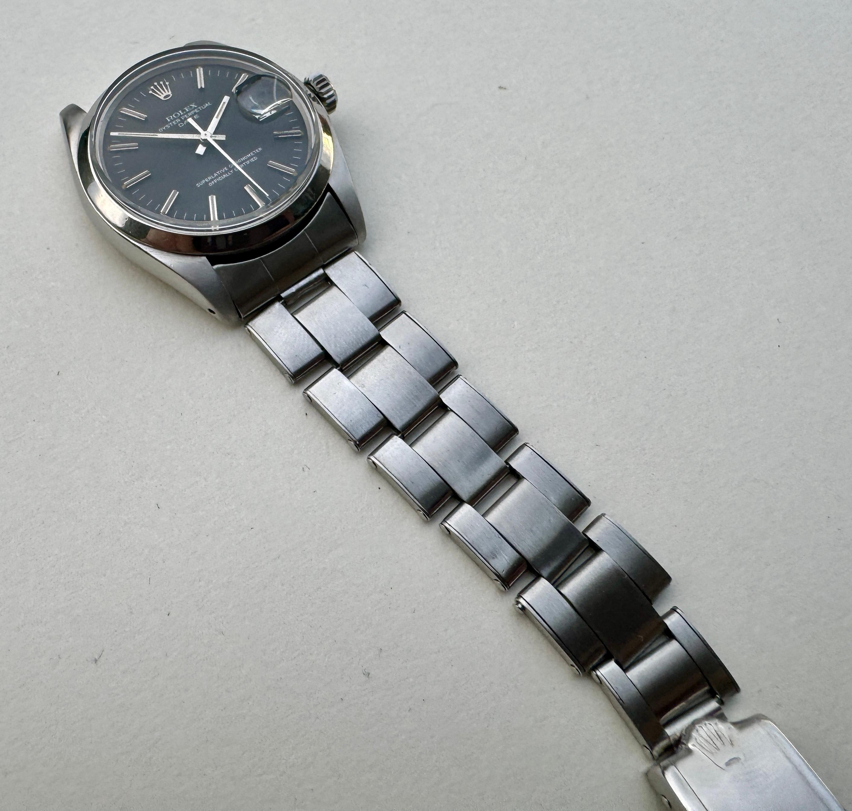 Montre Rolex Oyster Perpetual Date 1500 cadran noir 9