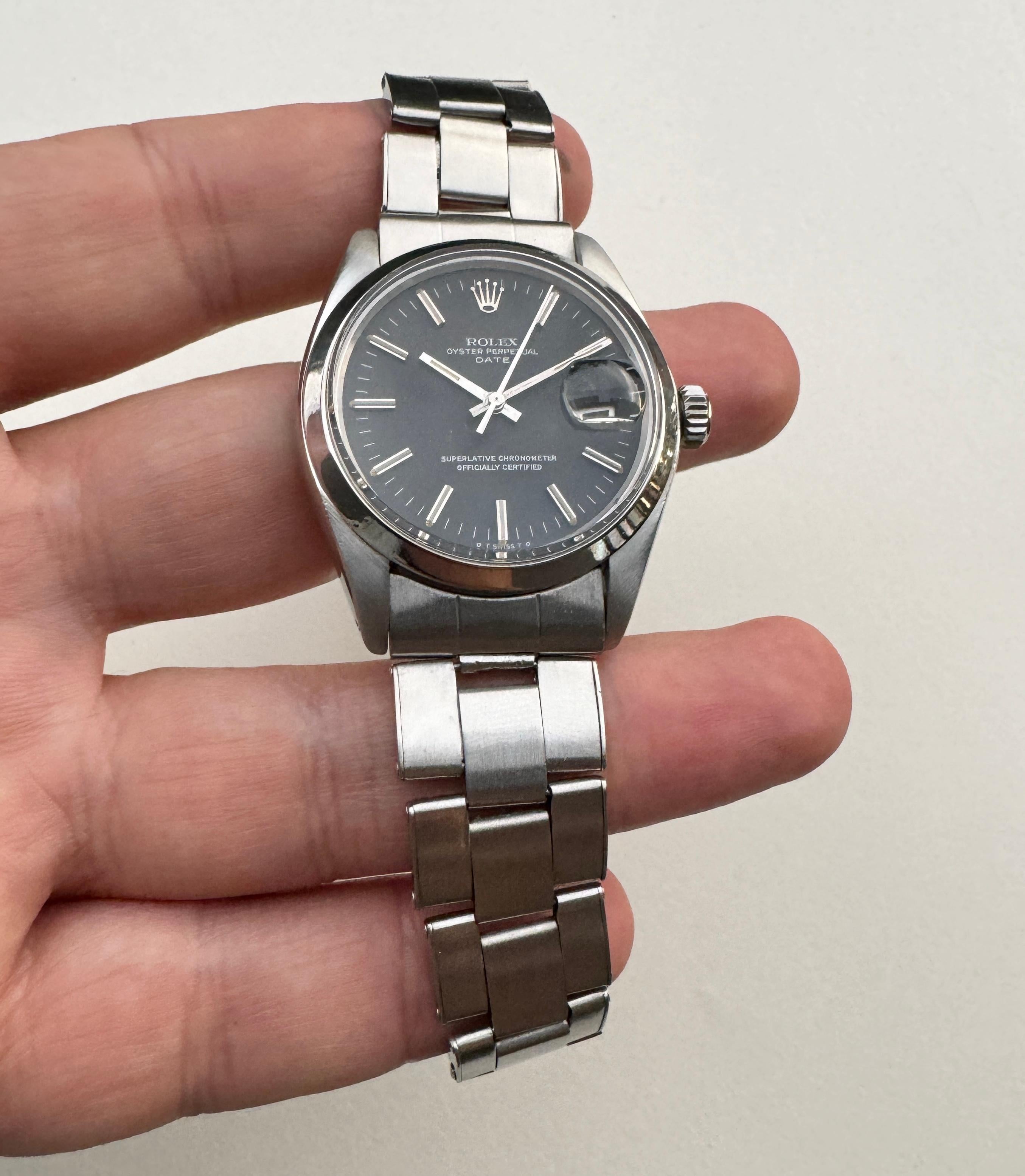 Montre Rolex Oyster Perpetual Date 1500 cadran noir 12