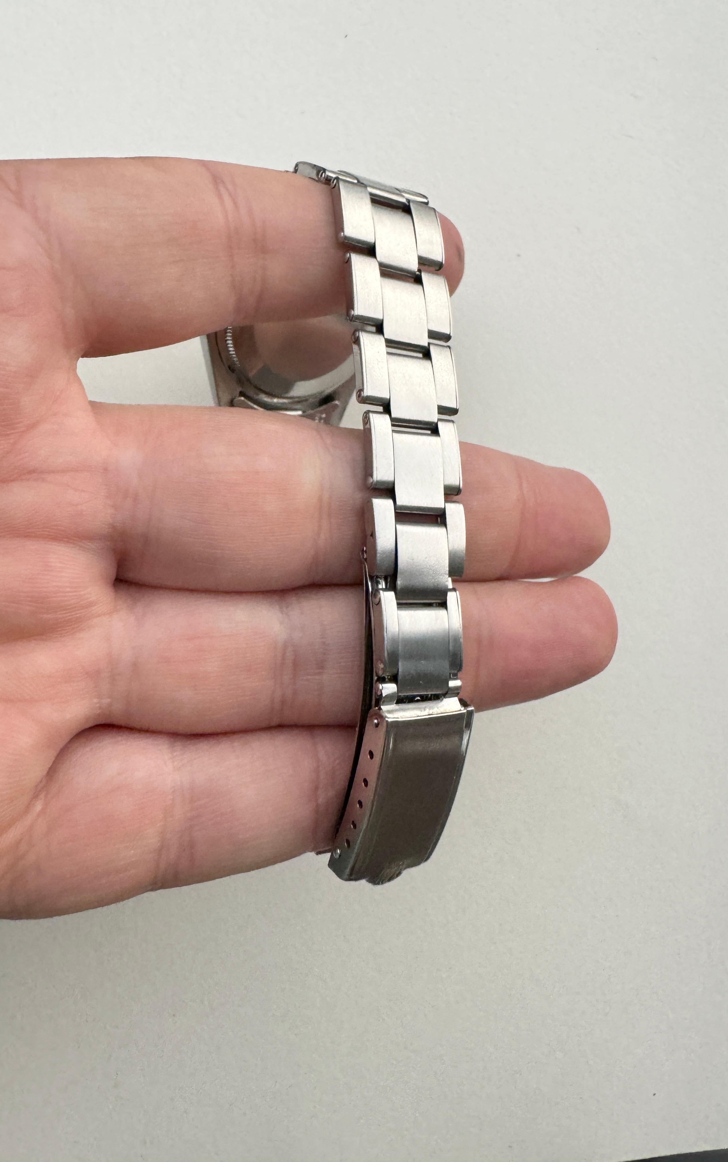 Montre Rolex Oyster Perpetual Date 1500 cadran noir 13