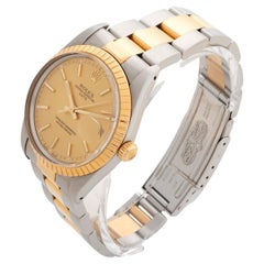 Rolex Oyster Perpetual Date 15053, 34mm stainless steel, champagne dial, c 1989