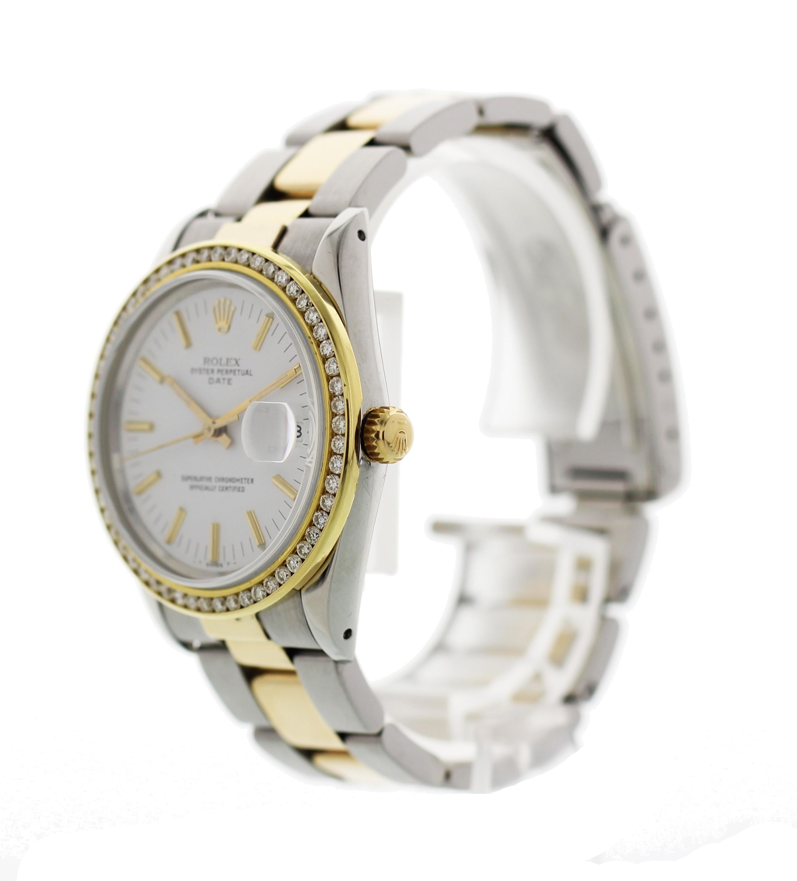 Rolex Oyster Perpetual Date 15053. Stainless steel 36mm case. Custom diamond bezel. White dial with gold hands and markers. Date aperture by the 3 o'clock. Two-tone oyster band with folding clasp that will fit a 7 inch wrist. Automatic movement.