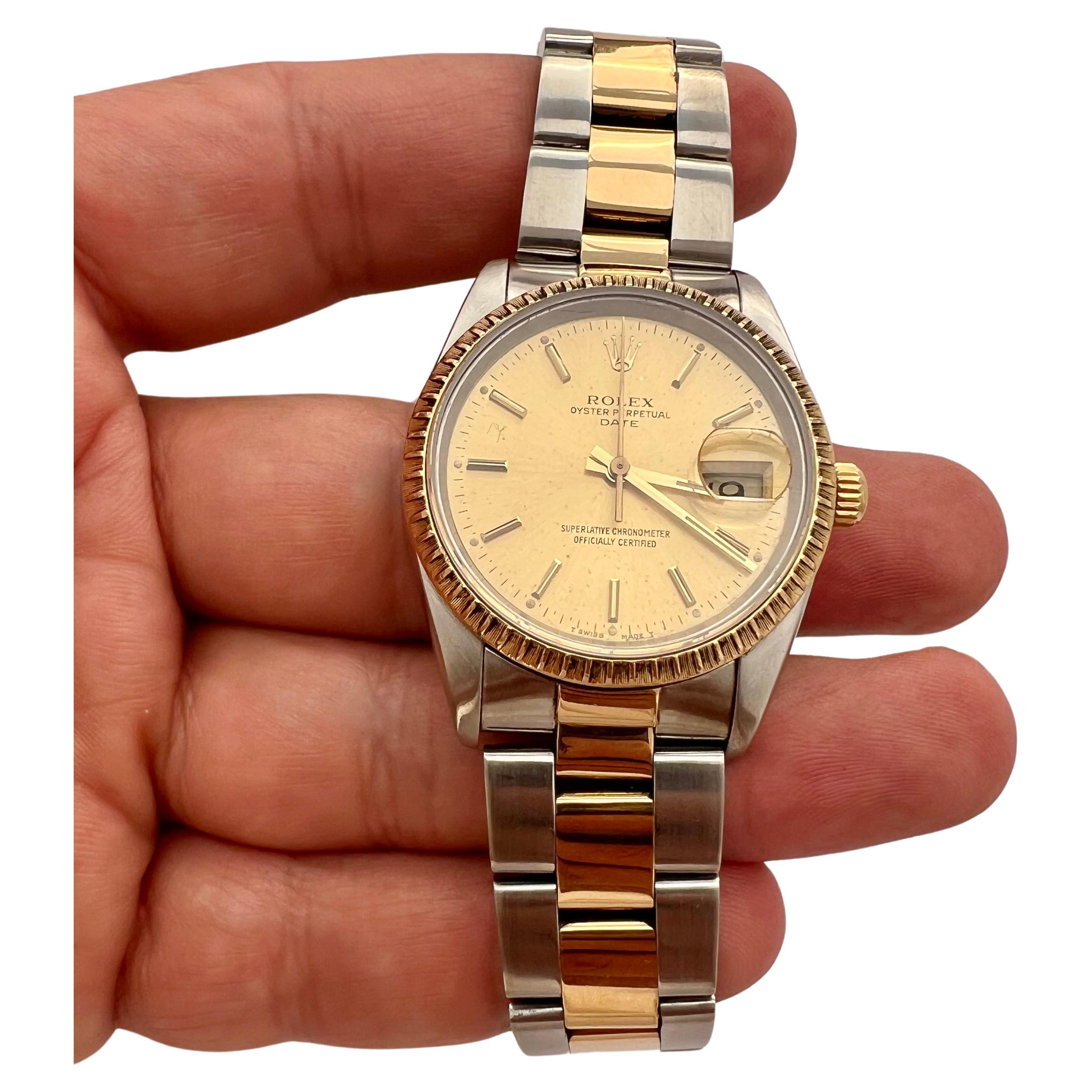 Rolex Oyster Perpetual Date 15223 Champagne Dial 18k Yellow Gold & Steel Watch   For Sale