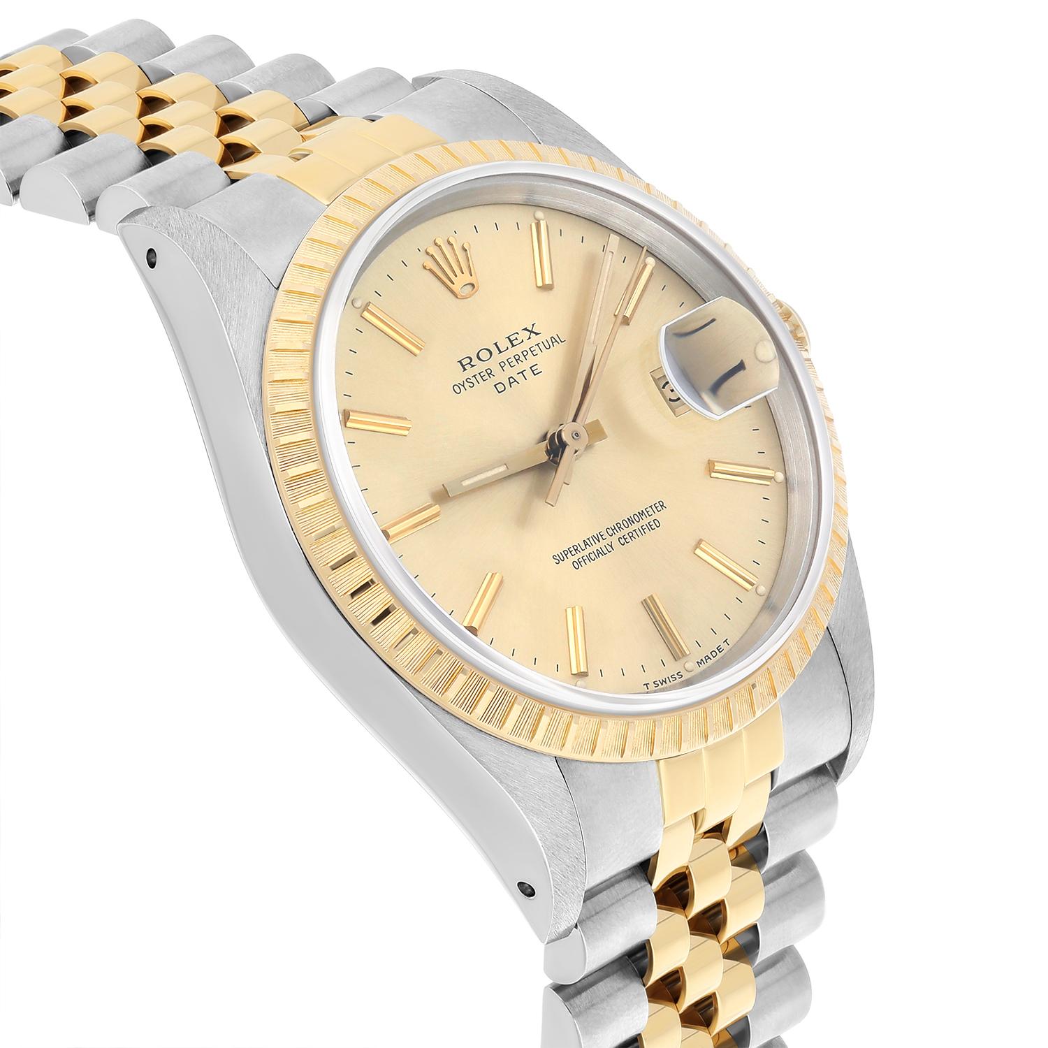 Rolex Oyster Perpetual Date 15223 Steel Yellow Gold Watch Engine Turned Bezel In Excellent Condition For Sale In New York, NY