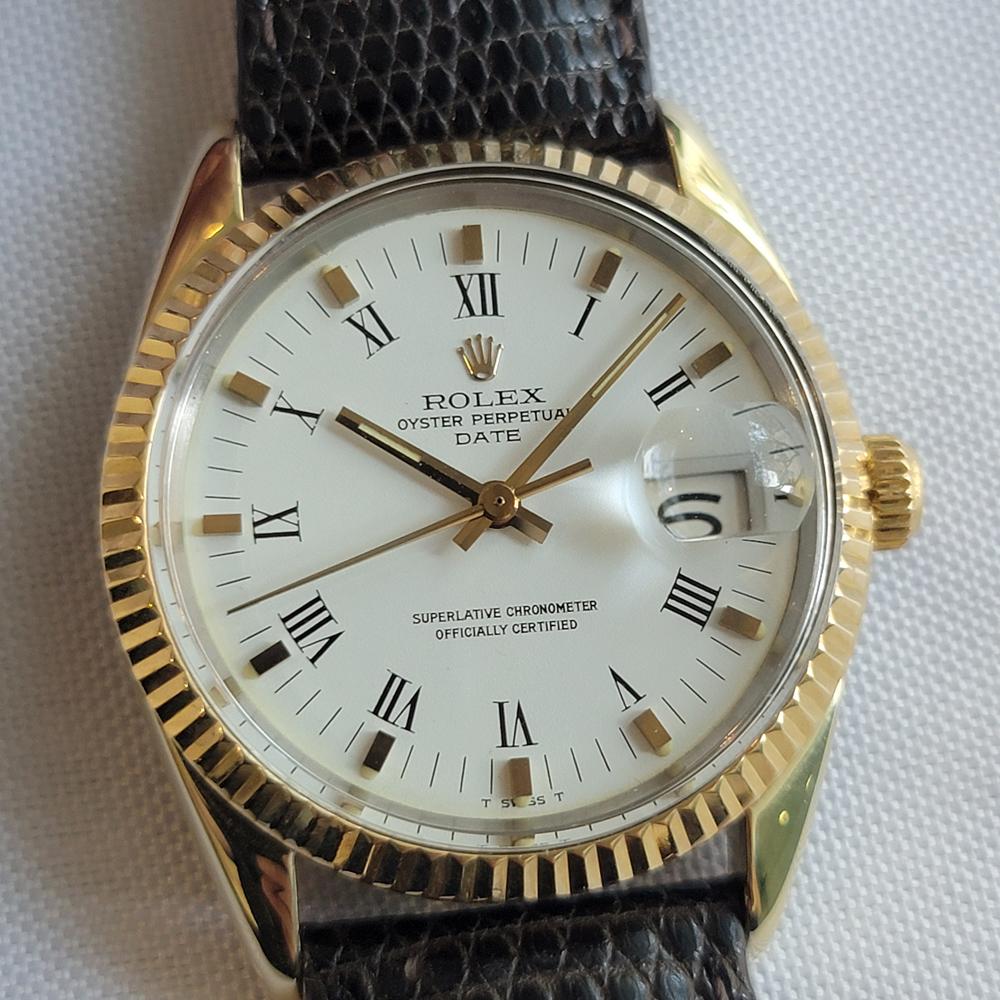 Luxurious classic, Men's Rolex Oyster Perpetual 1550 Date automatic with 14k solid gold bezel, c.1979, in excellent working condition. Verified authentic by a master watchmaker. Gorgeous Rolex signed polar white dial, applied block and painted black