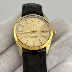 Rolex Oyster Perpetual Date 1550 34mm Champagne Dial 14k Gold Stainless Steel