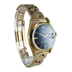 Rolex Oyster Perpetual Date 18 Karat Gold Ref 1500 Rare Black Dial from 1964