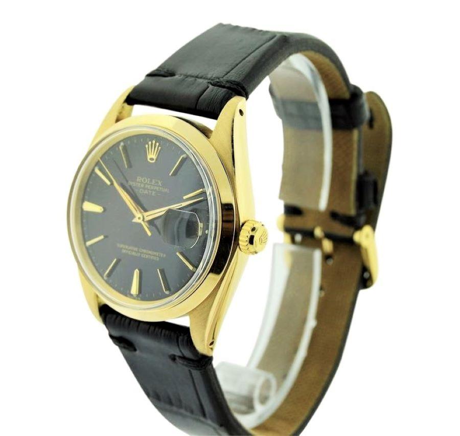 FACTORY / HOUSE: Rolex Watch Company
STYLE / REFERENCE: Oyster Perpetual Date / 1500
METAL: 18Kt. Yellow Gold
CIRCA: Approx. 1964 
MOVEMENT / CALIBER: Perpetual Automatic / 1570
DIAL / HANDS: Original Black / Original Batons
DIMENSIONS:  40mm X 