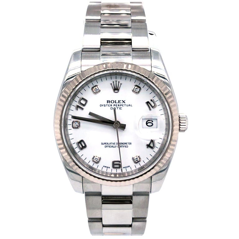 This Beautiful Rolex Oyster Perpetual Date 34 Watch has a Stainless Steel 34 mm Round Case with Screw Down Crown and a Stainless Steel Bezel. This Unisex Rolex Oyster Perpetual Date 34 has an attractive Silver Dial with Factory Diamonds Dial