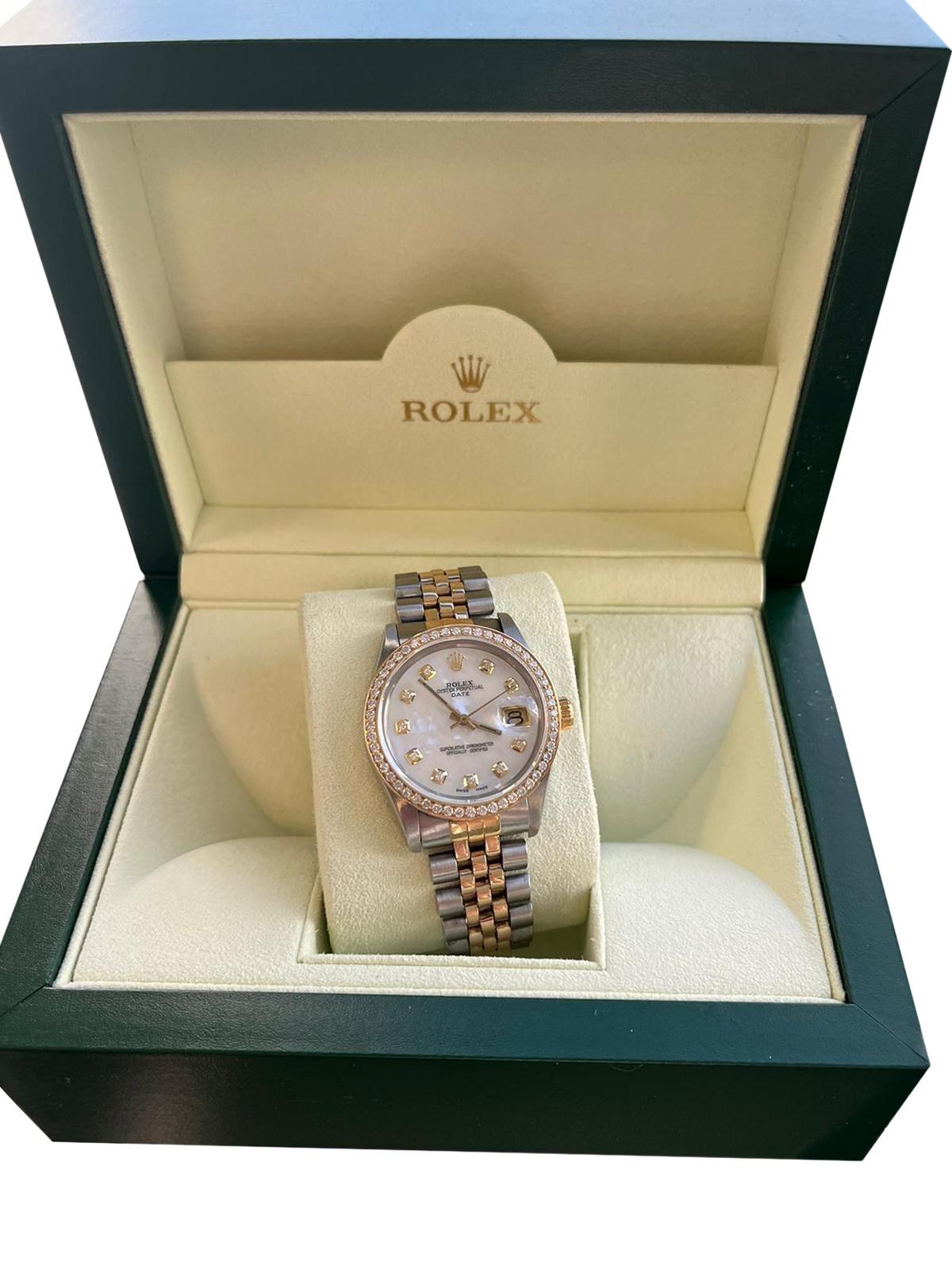 Rolex Oyster Perpetual Date, Reference Number: 15053, Case Size/Material: 34mm Stainless Steel/Gold, Aftermarket Natural Diamond Bezel, Aftermarket Mother of Pearls Diamond Hour Markers (Dial), with Automatic Movement, Stainless Steel, and Yellow