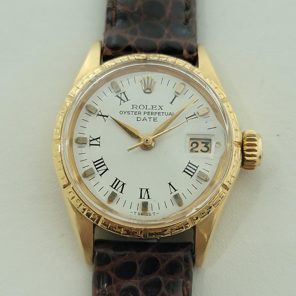 Timeless luxury, Rolex Lady Oyster Perpetual Date automatic, c.1967, in excellent working condition. Verified authentic by a master watchmaker. Rolex signed white dial, applied index and painted Roman numeral hour markers, gilt minute and hour