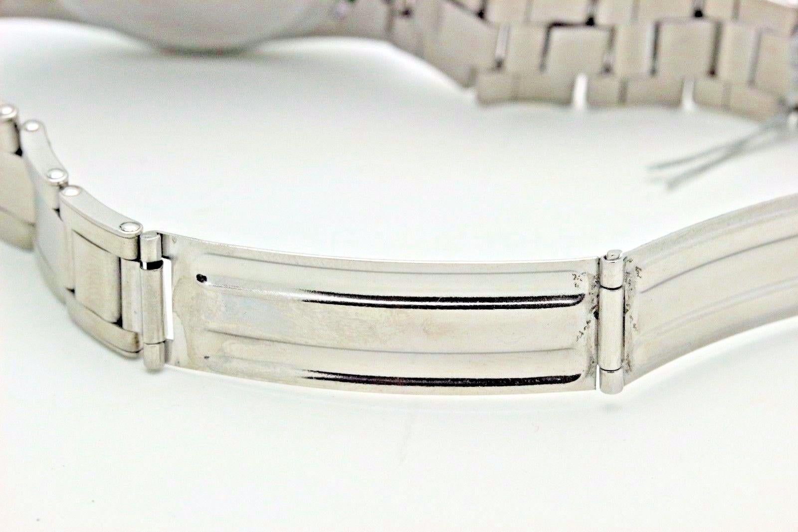 Rolex Oyster Perpetual Date 6534 Stainless Steel Roulette Date Window In Excellent Condition In San Diego, CA