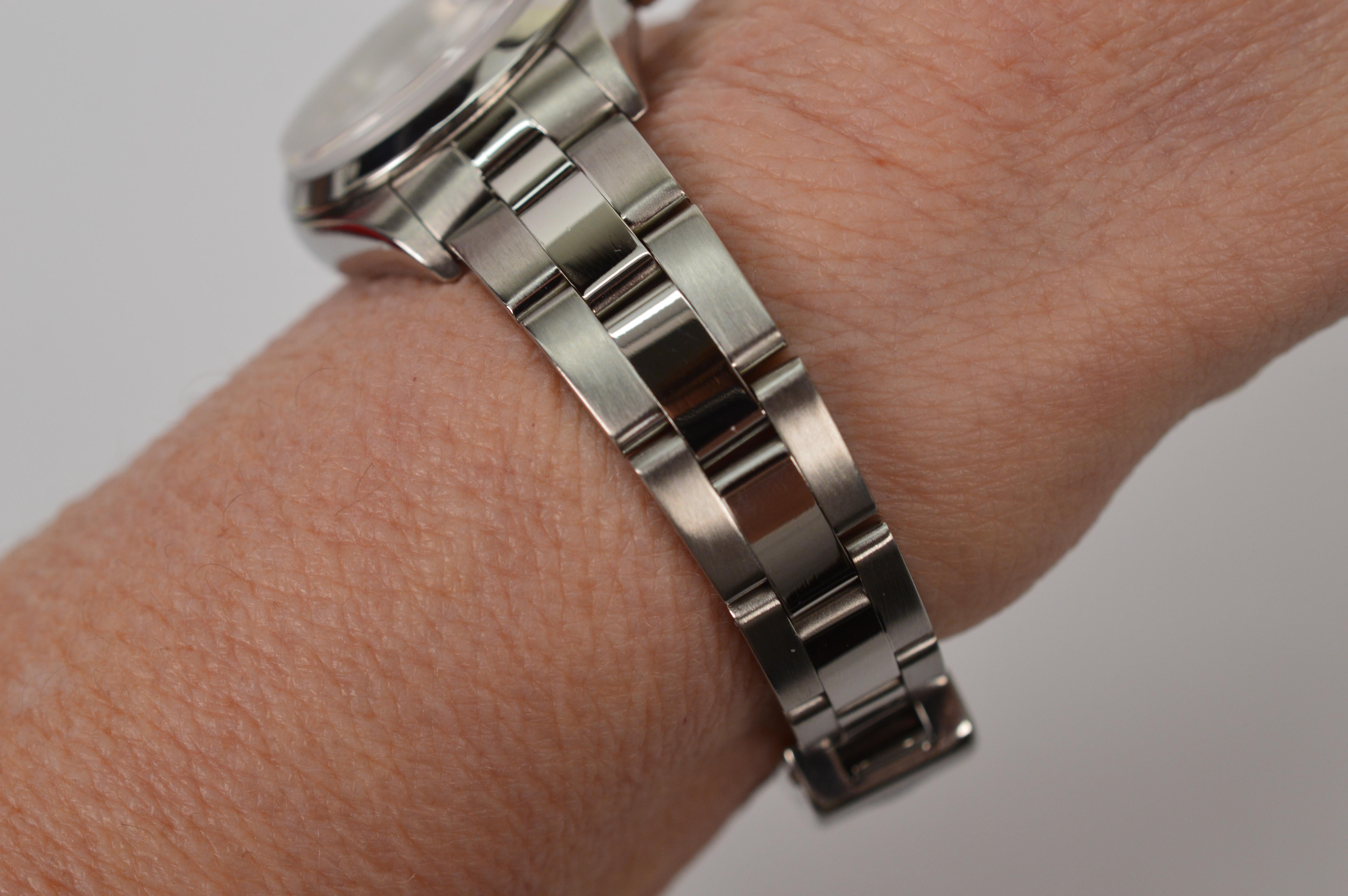 Rolex Oyster Perpetual Date 79160 Montre-bracelet pour femme en acier inoxydable en vente 8