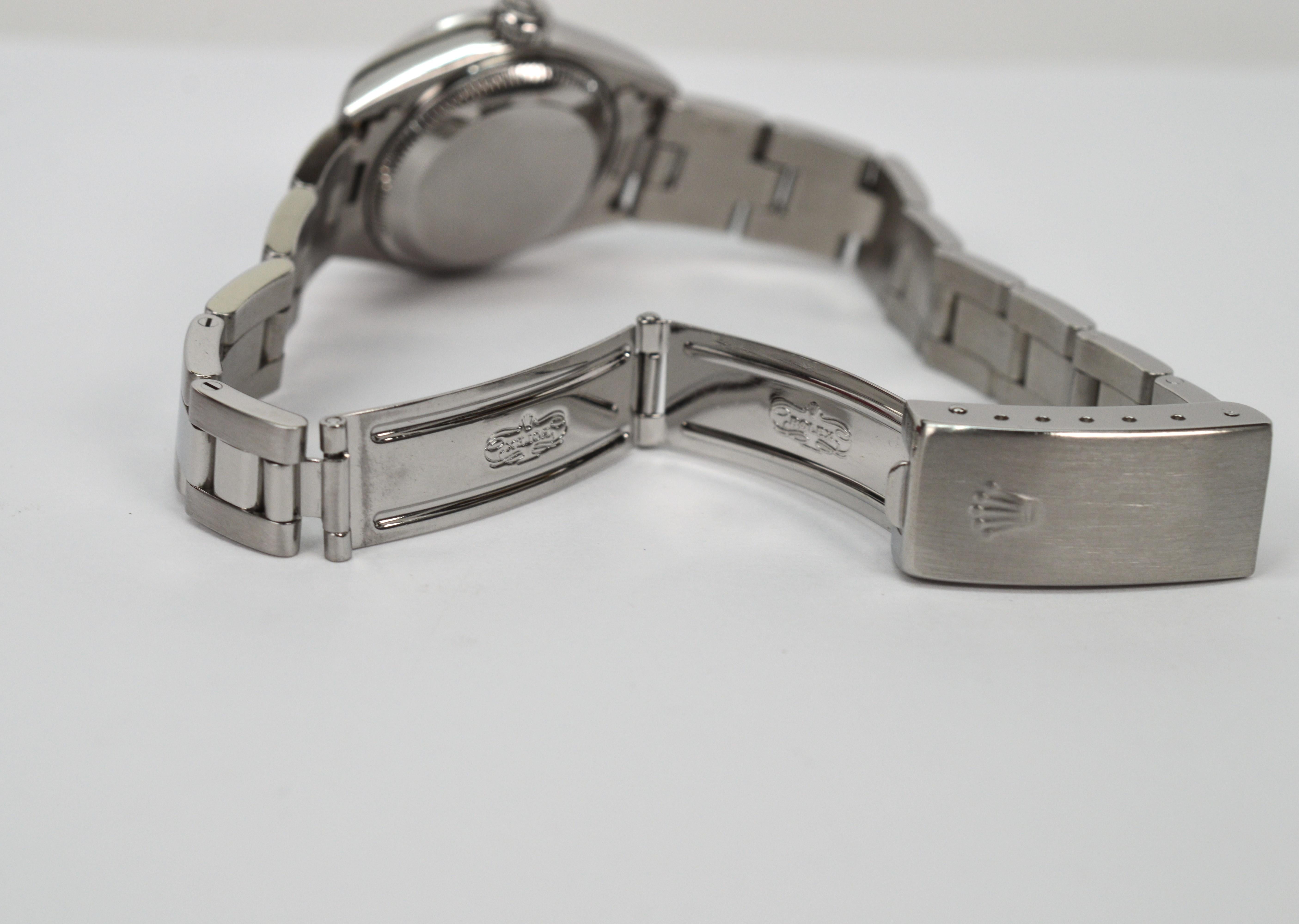 Rolex Oyster Perpetual Date 79160 Montre-bracelet pour femme en acier inoxydable en vente 9