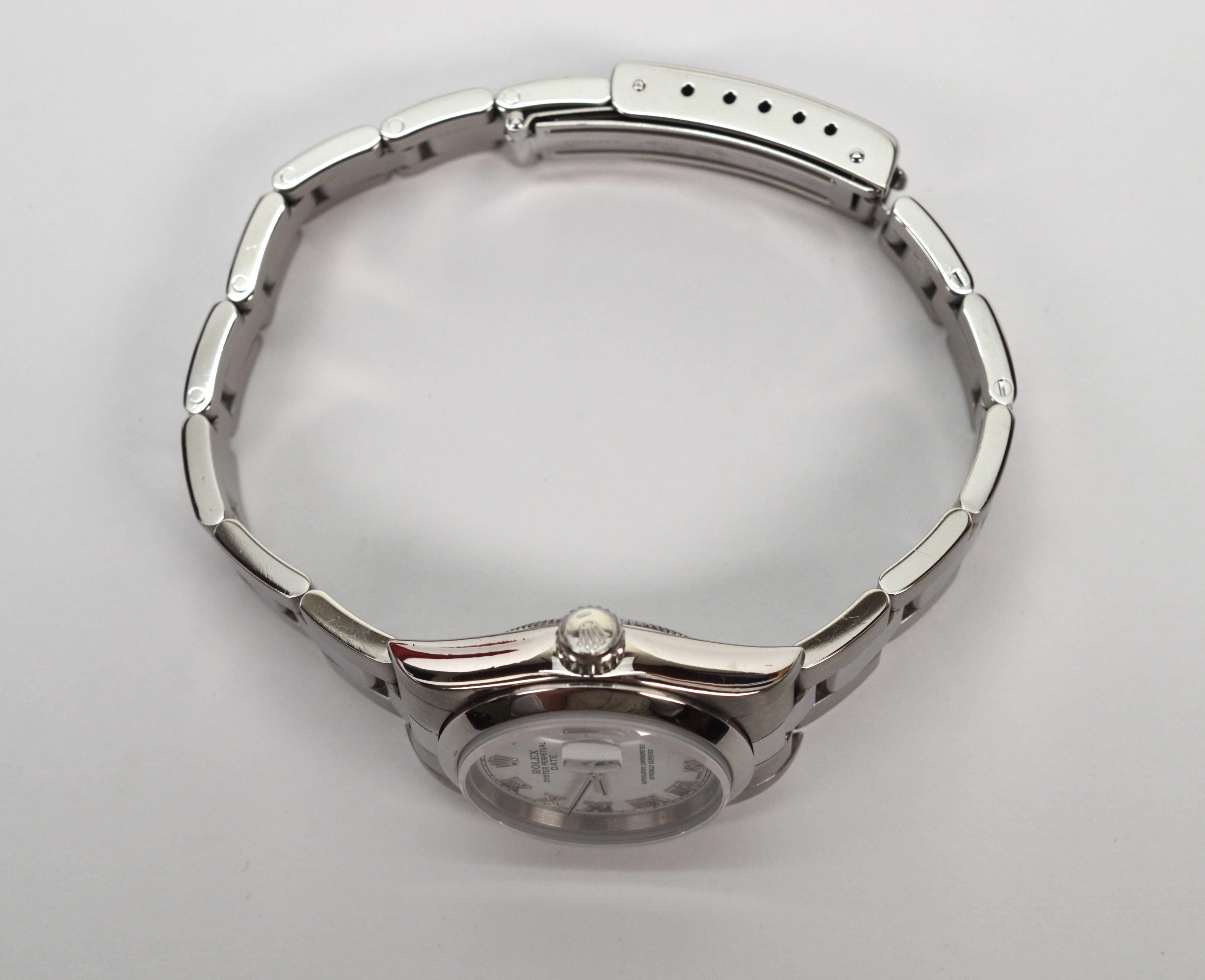 Rolex Oyster Perpetual Date 79160 Montre-bracelet pour femme en acier inoxydable en vente 10