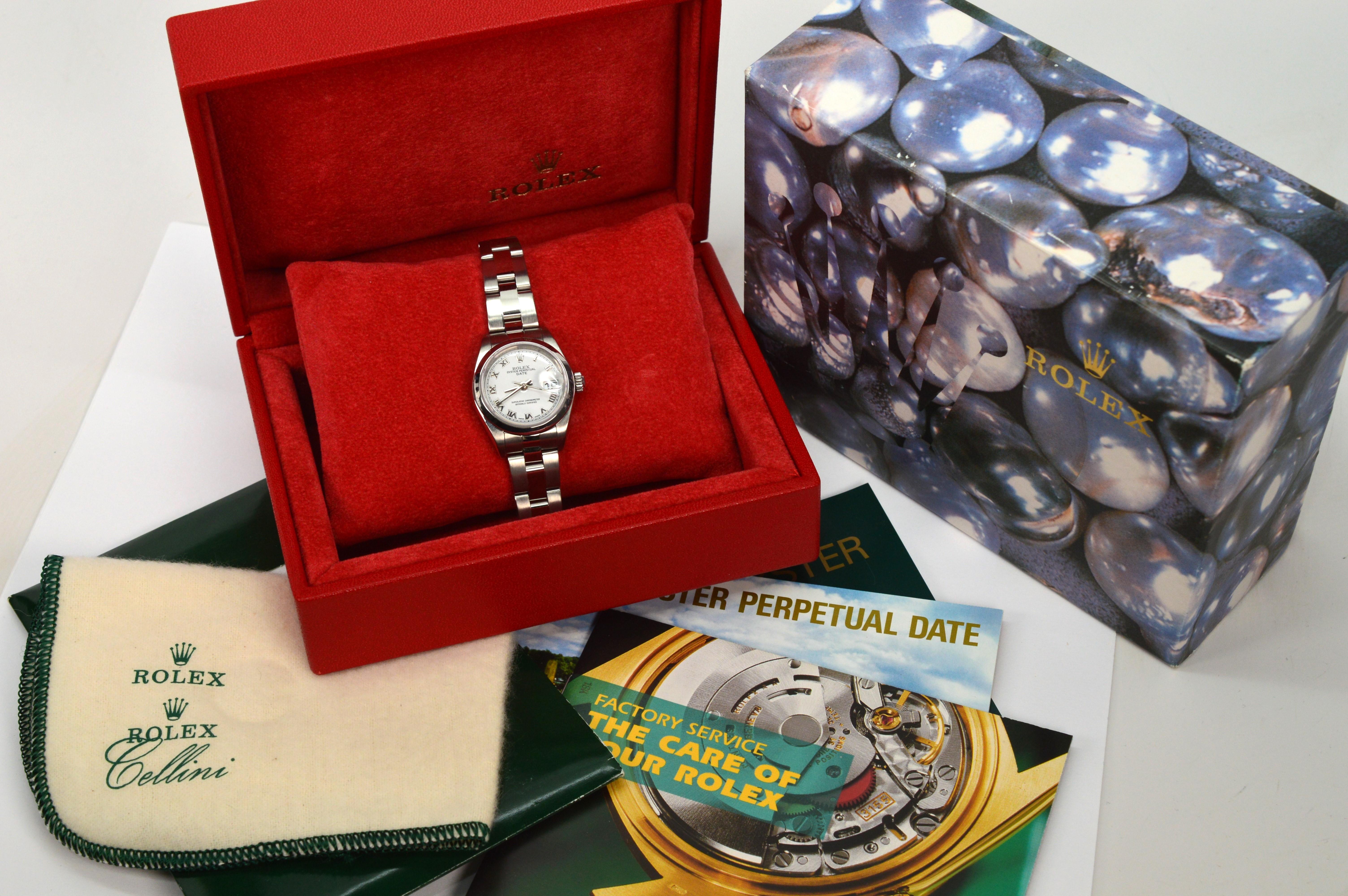 Rolex Oyster Perpetual Date 79160 Montre-bracelet pour femme en acier inoxydable en vente 12