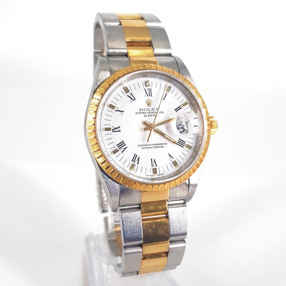Rolex Oyster perpetual date with case material consisting of stainless steel and 18ct Gold. 

Model number: K484272 & Serial number: 15223
Movement: Automatic
Case Size: 34mm
Bracelet material: Stainless steel + 18ct Gold
Dial type: White
Condition: