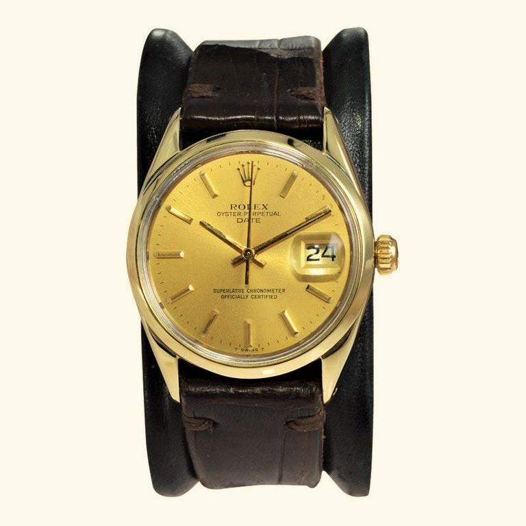 FACTORY / HOUSE: Rolex Watch Company
STYLE / REFERENCE: Oyster Perpetual / Date  
METAL / MATERIAL: Gold Shell / Gold Filled / Stainless Steel
DIMENSIONS: 40mm  X 34mm
CIRCA: 1972
MOVEMENT / CALIBER:  26 Jewels / Manual Winding / Cal. 
DIAL / HANDS: