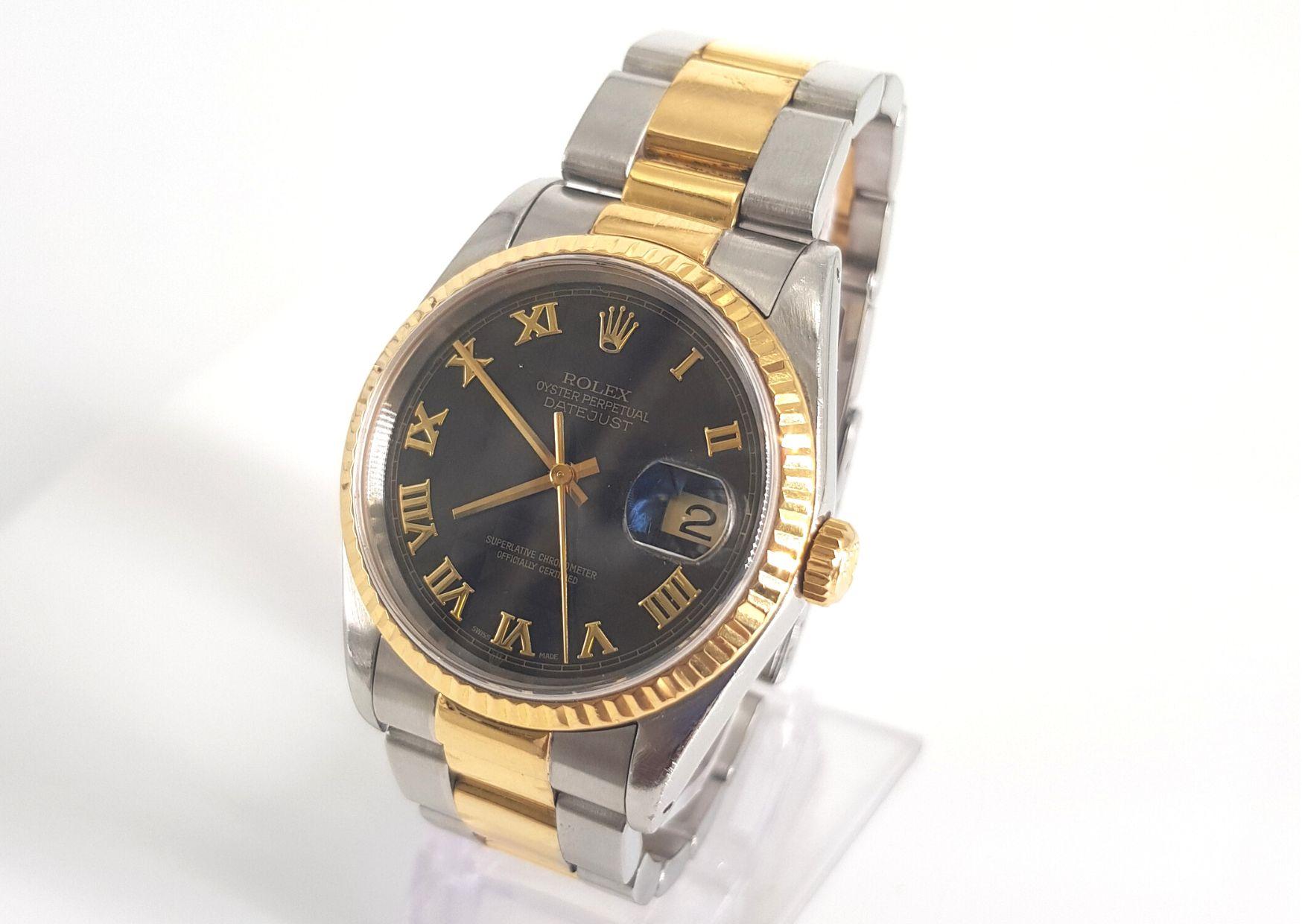 Make a statement.
GENDER:  Male
MOVEMENT: Automatic
CASE MATERIAL: Stainless Steel & 18ct Gold
DIAL: 36mm
STRAP: 49mm
BRACELET MATERIAL: Stainless steel & 18ct Gold
DIAL TYPE: Black Pyramid Roman Dial
CONDITION: 8/10 
MODEL NUMBER: 16233
SERIAL