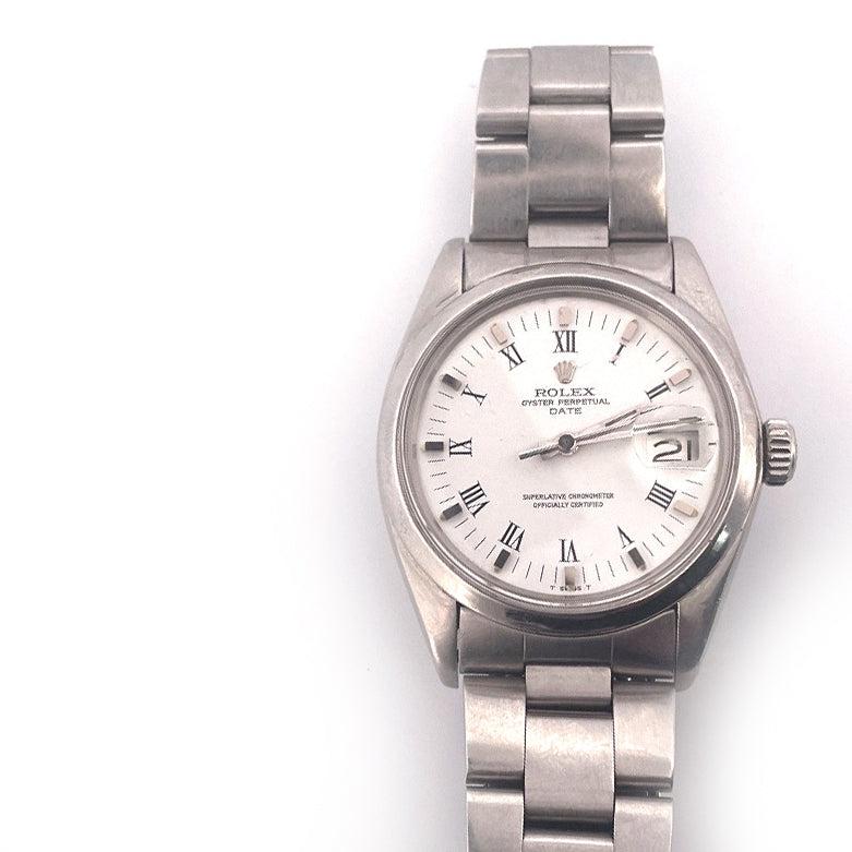 Brand: Rolex
Department: Unisex
Type: STAINLESS
Bezel Color: STANLESS
Dial Color: White
Indices:12-Hour Dial
Style: Dress/Formal
Case Size: 36mm
Features: 12-Hour Dial

This Rolex Oyster Perpetual Date wristwatch features a classic numeral dial