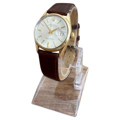 Rolex Oyster Perpetual Date Ref. 1550 Sunburst Zifferblatt Gold Muschelkappe 34mm Uhr