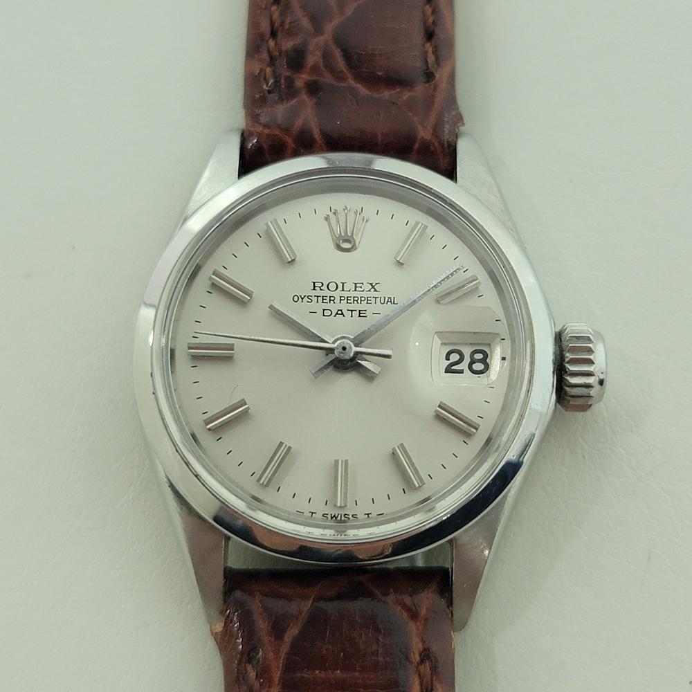 Timeless classic, Rolex Lady Oyster Perpetual Date automatic, c.1968, in excellent working condition. Verified authentic by a master watchmaker. Gorgeous Rolex signed silver dial, applied baton index hour markers, silver minute and hour hands,