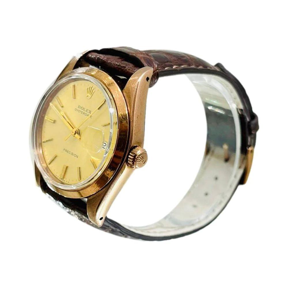 Rolex Oyster Perpetual Date Vintage 1960's

Rare  watch - Rose 14k gold plated case, buckle with steel back. 
Champagne,  Rolex-signed dial, applied indice hour markers,
Dauphine minute and hour hands, sweeping central second hand,
date display at