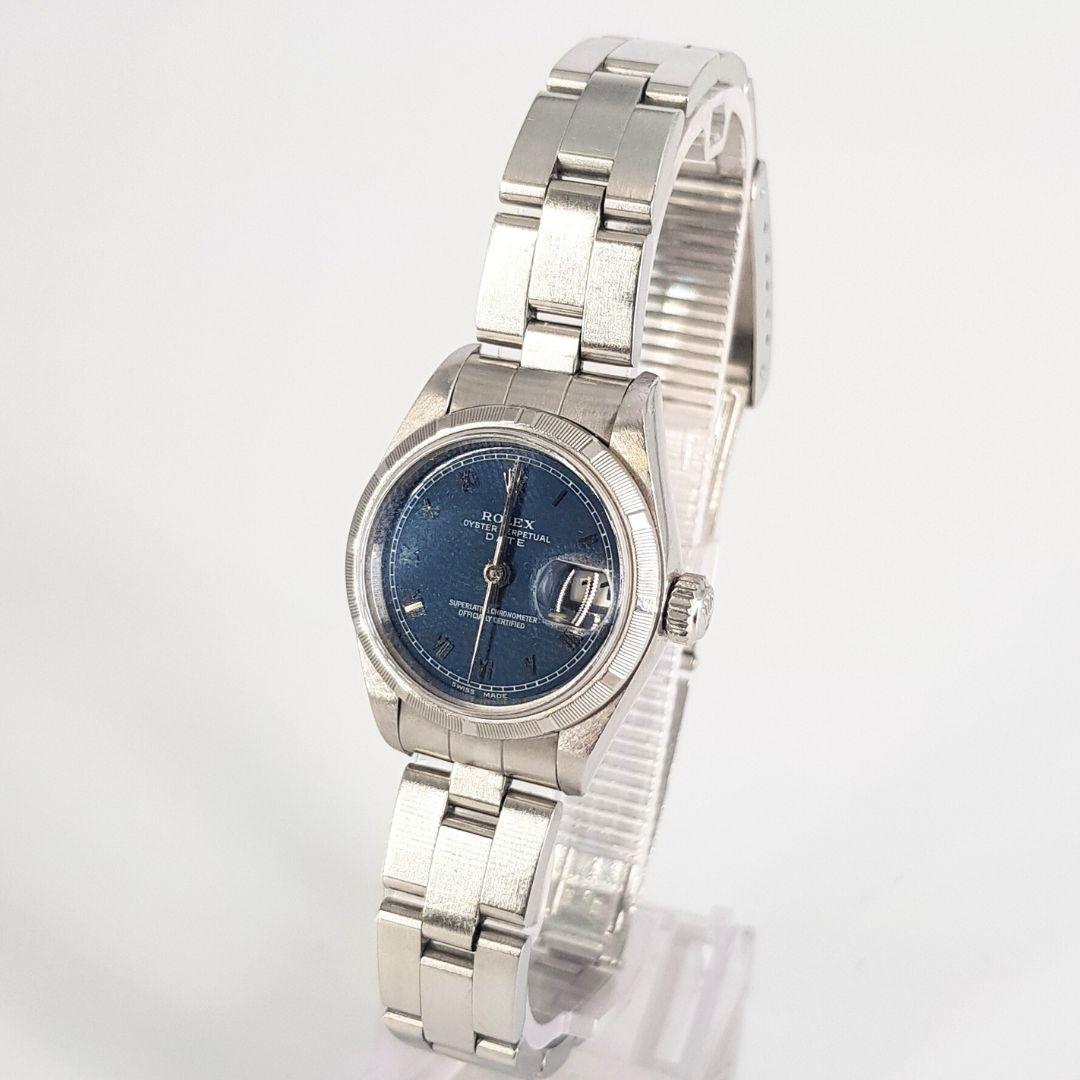 Unique
GENDER:  Unisex
MOVEMENT: Automatic
CASE MATERIAL: Steel 
DIAL: 24mm
DIAL COLOUR: Blue
STRAP: 50mm
BRACELET MATERIAL: Steel 
CONDITION: 7/10 
MODEL NUMBER:  xxxx
SERIAL NUMBER: xxxx
YEAR: 2000’s
BOX – No
PAPERS – No
