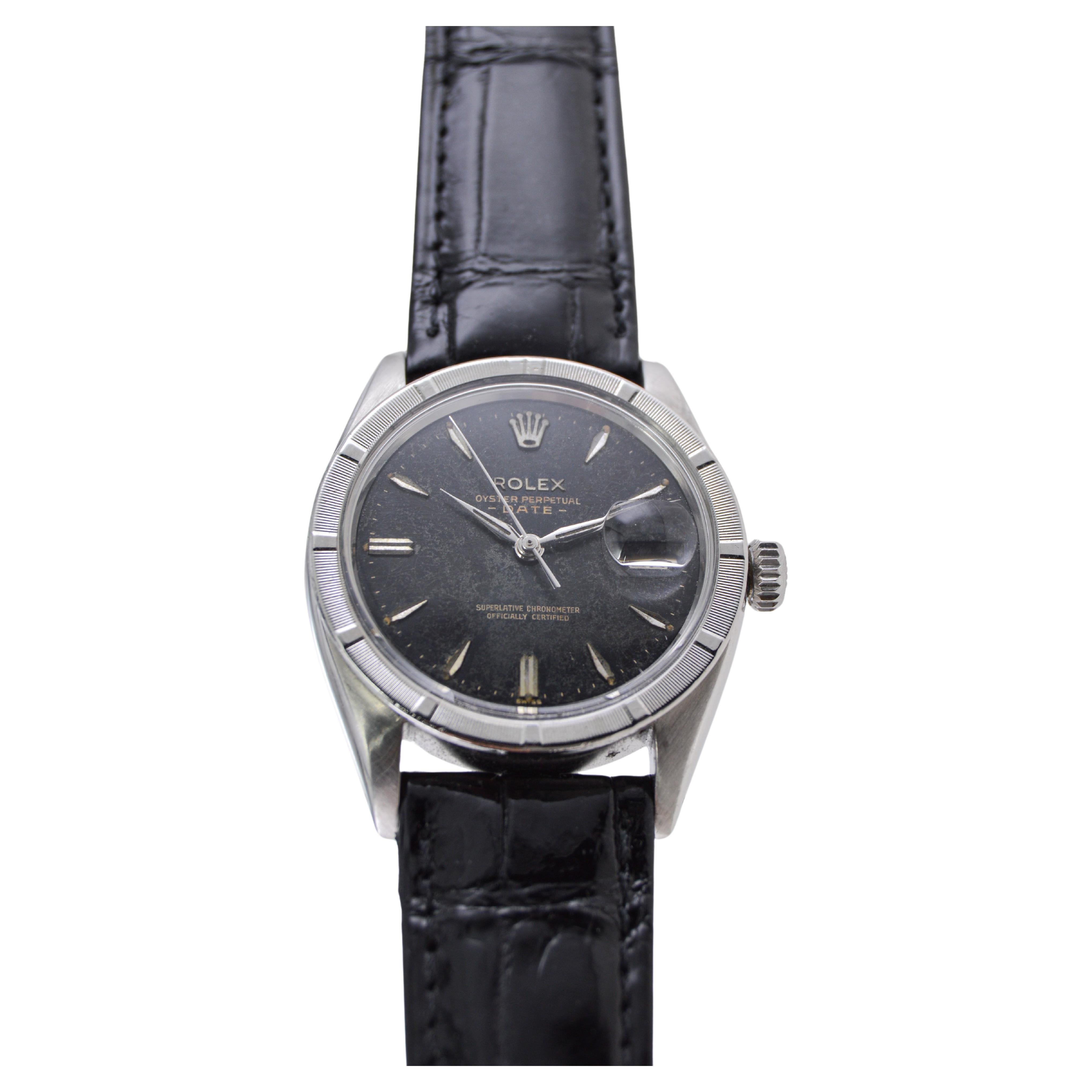 Modern Rolex Oyster Perpetual Date With Rare Engine Turned Bezel and Black Dial 1960's For Sale