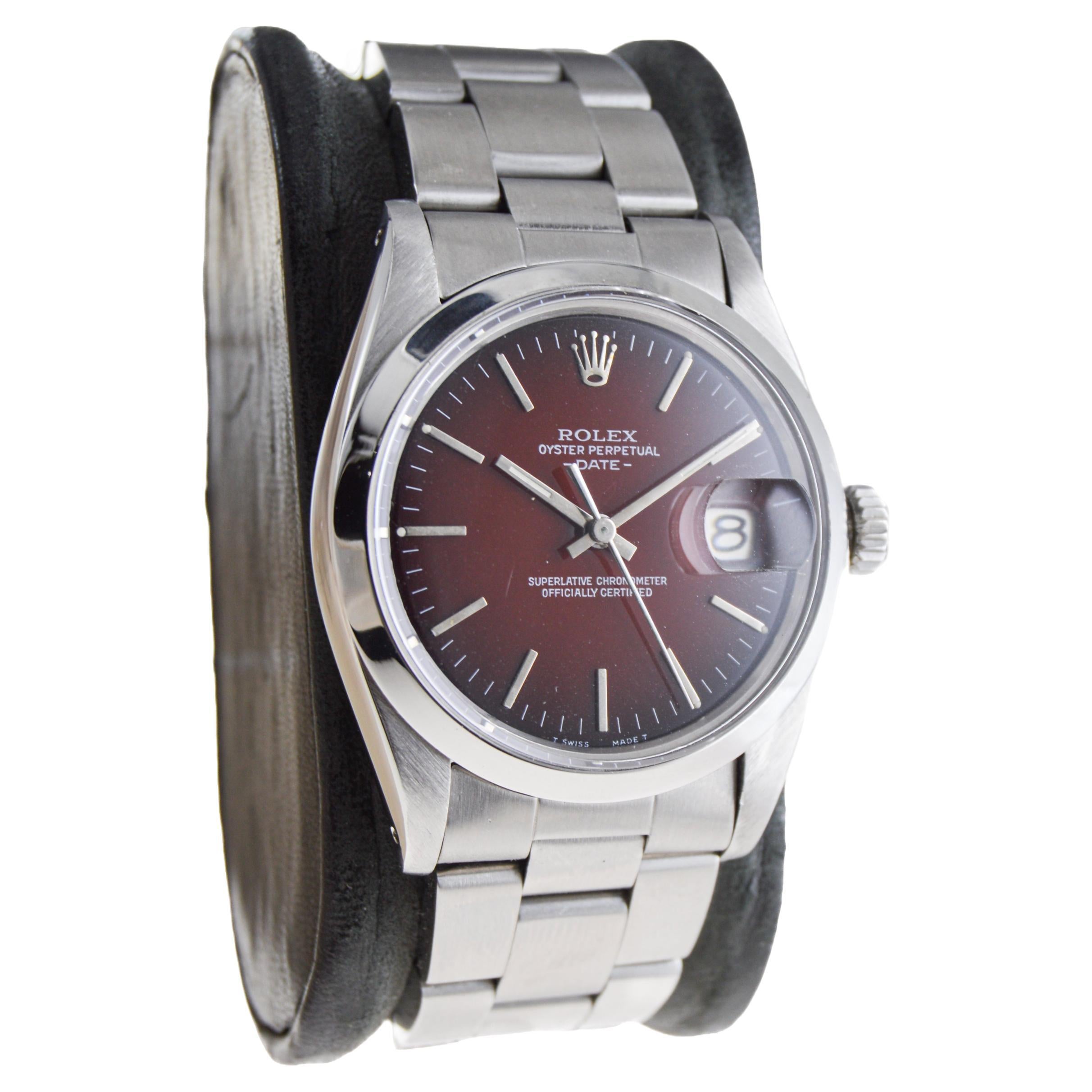 Modern Rolex Oyster Perpetual Date with Rare, Original Shaded Sunburst Red Dial 1970's For Sale