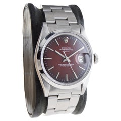 Rolex Oyster Perpetual Date with Rare, Original Shaded Sunburst Red Dial 1970's