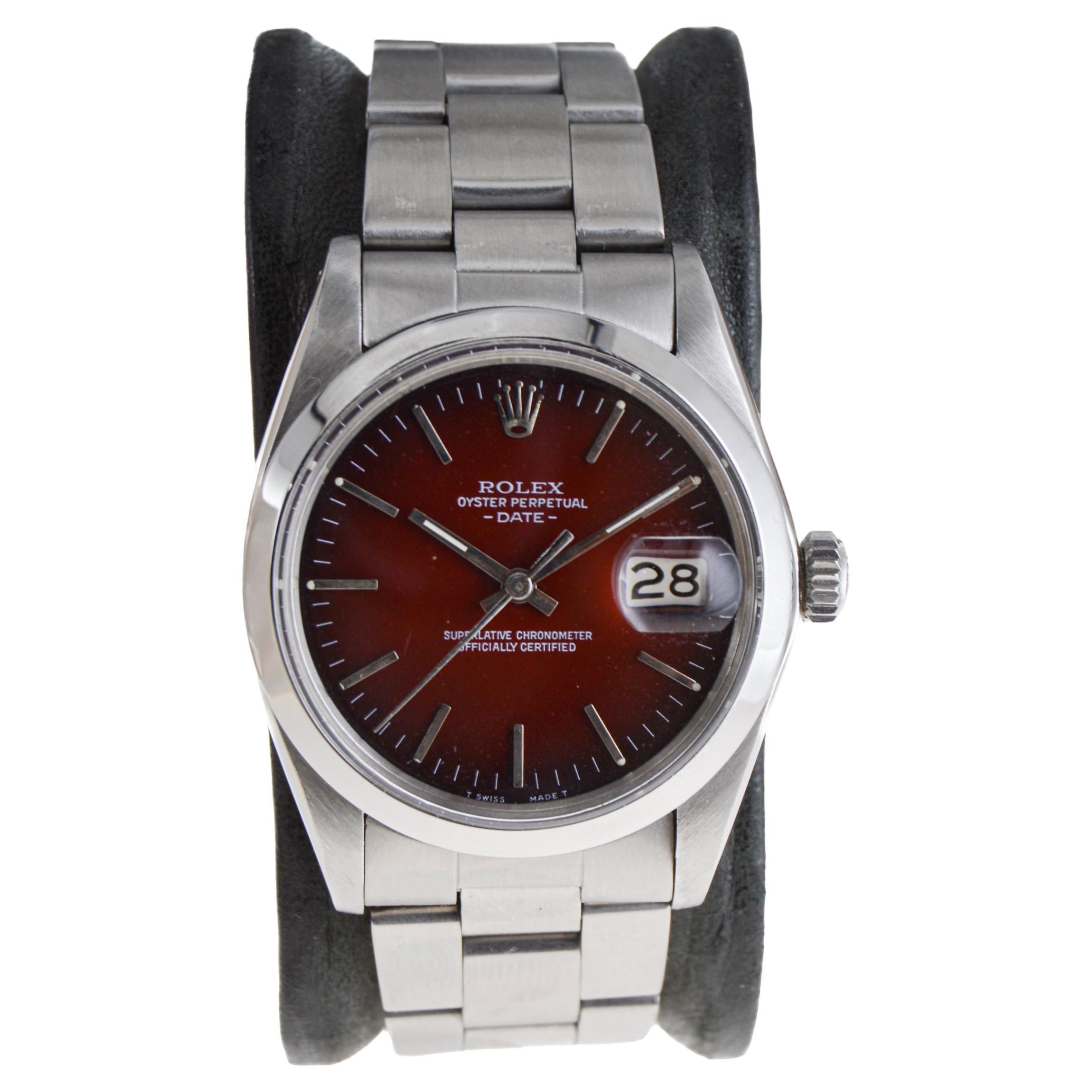 Modern Rolex Oyster Perpetual Date with Rare, Original Shaded Sunburst Red Dial 1970's For Sale