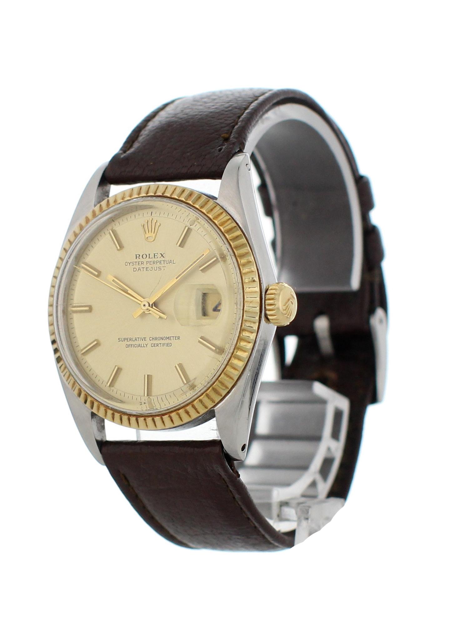 Rolex Oyster Perpetual Datejust 1601 Men's Watch. Stainless steel 36mm case. 18k Yellow gold bezel. Champagne dial with gold hands and stick markers. Brown leather strap with Rolex buckle. Will fit up to a 7.25-inch wrist. Automatic self-wind