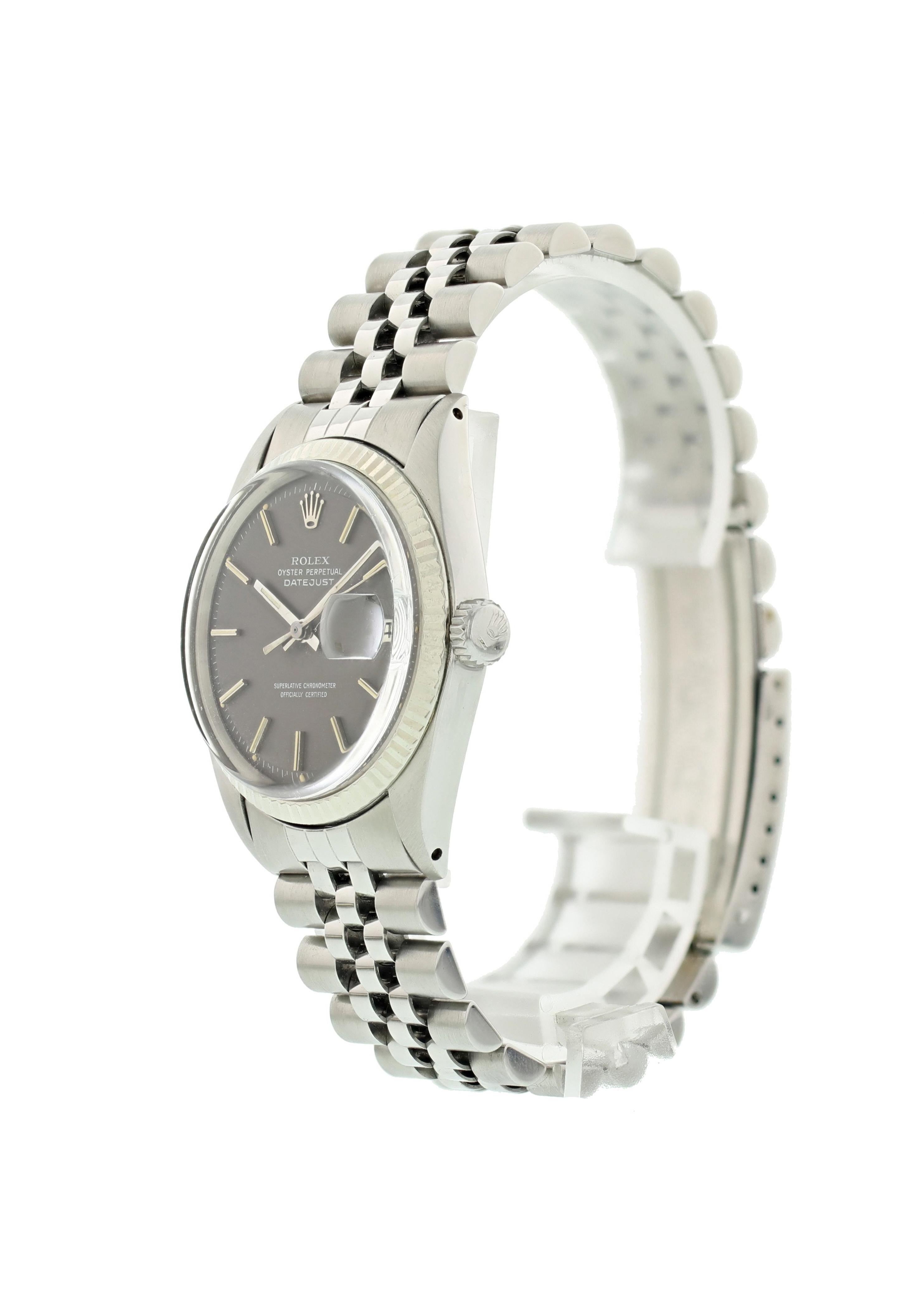 Rolex Oyster Perpetual Datejust 1601 Men's Watch. 36mm Stainless steel case. 18k white gold fluted bezel. Grey dial with steel hands and indexes hour markers. Date display at the 3 o'clock position. Stainless steel jubilee Bracelet with a fold over