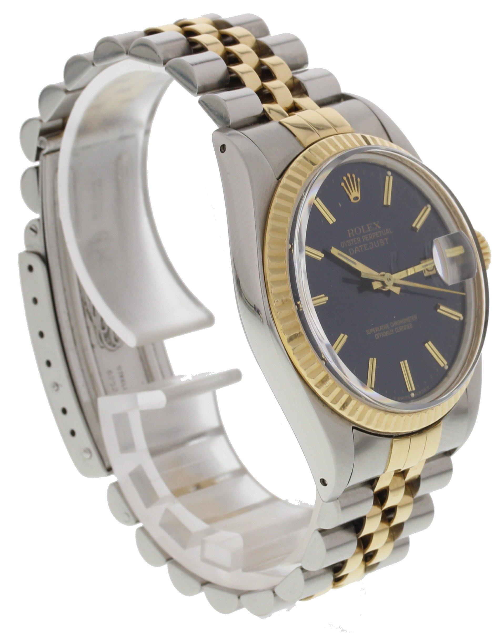 Rolex Oyster Perpetual Datejust. Stainless steel 36mm case. 18k yellow gold fluted bezel. Blue dial with date display with gold hands and markers. 18k yellow gold and stainless steel band with stainless steel fold over clasp. Will fit up to a 7 inch