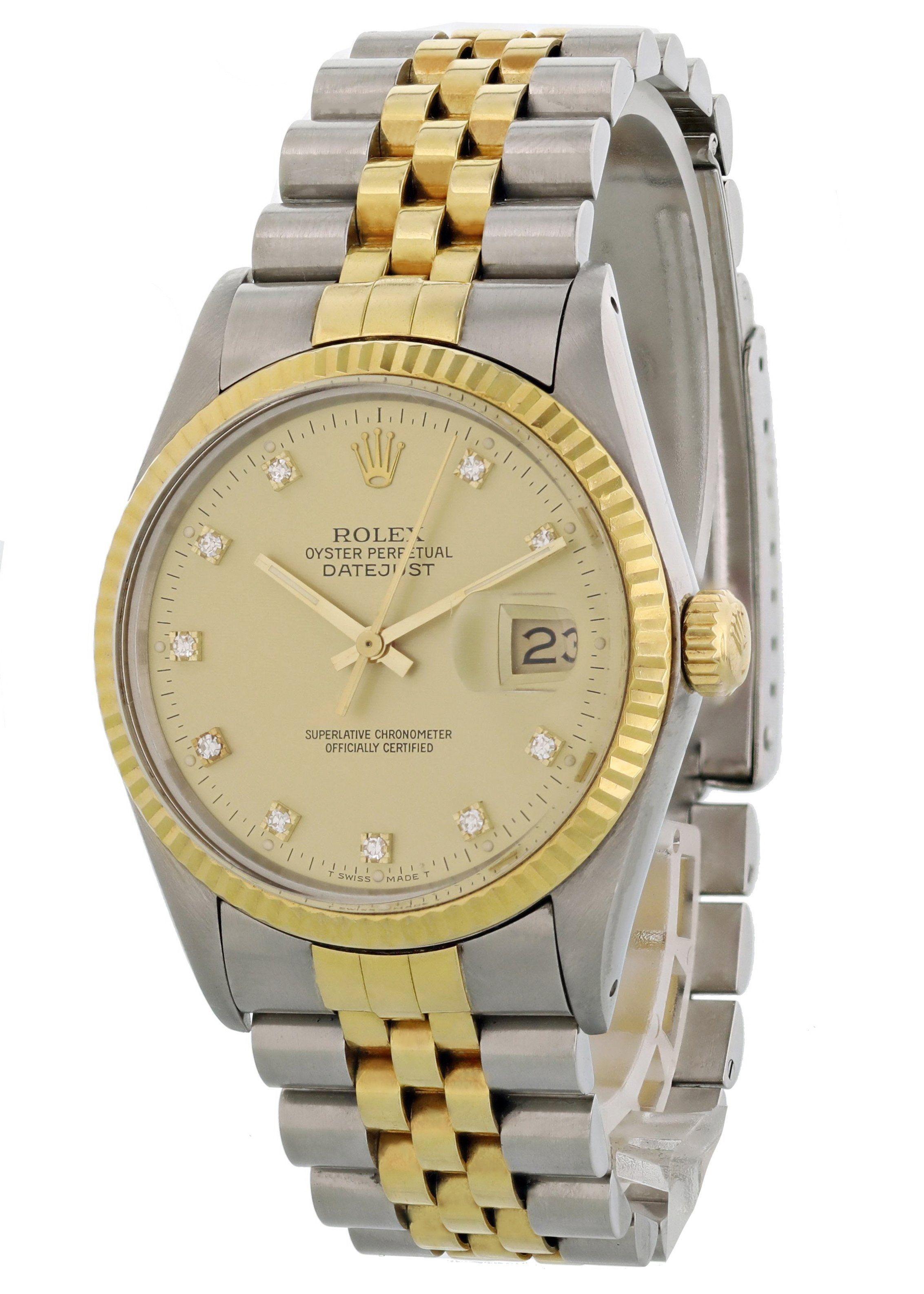 Rolex Oyster Perpetual Datejust 16013 Mens Watch. Stainless steel 36mm case. 18k yellow gold fluted bezel. Champagne diamond dial with gold hands and stick index markers. Date display at the 3 o'clock position. 18k yellow gold and stainless steel