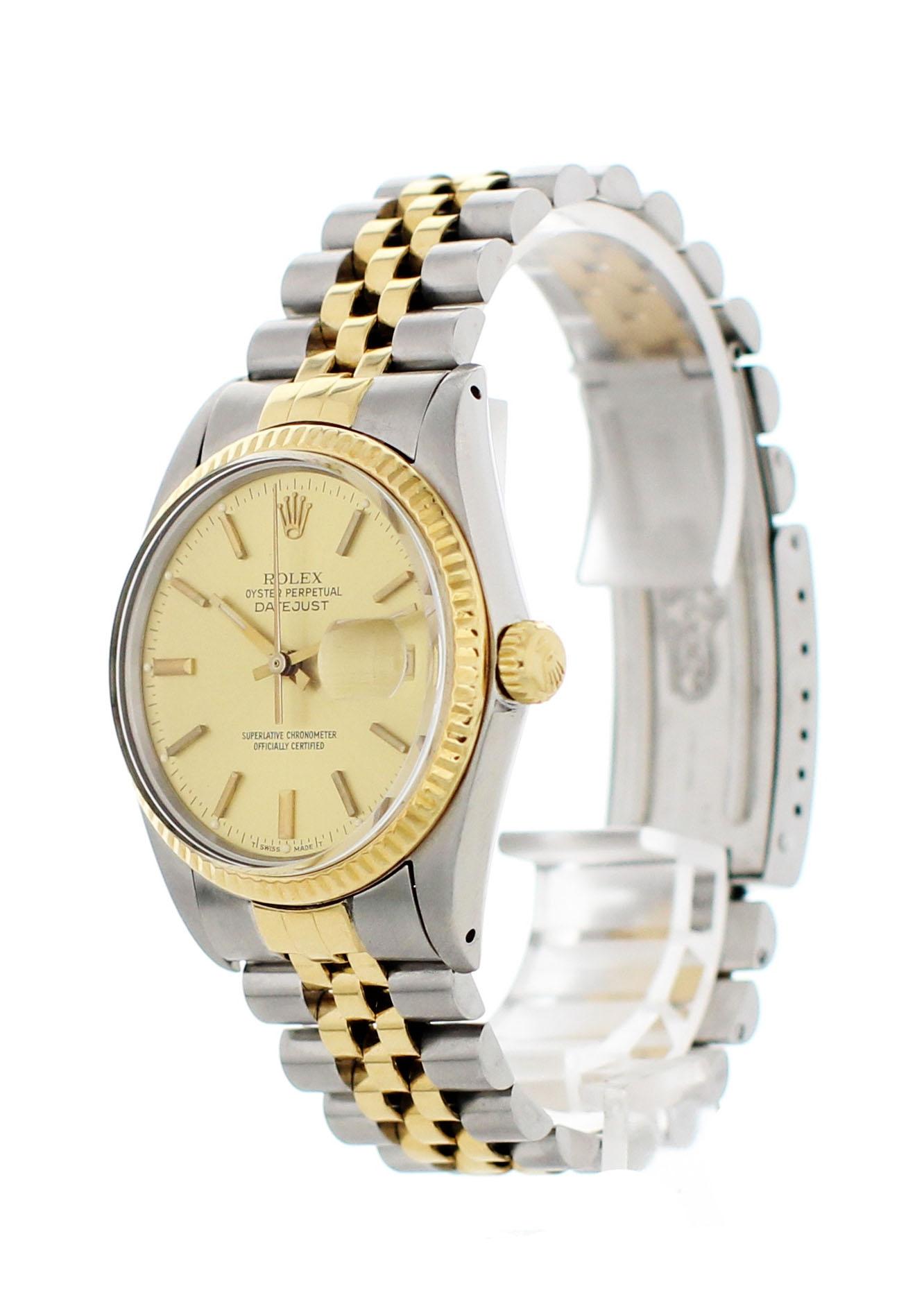Rolex Oyster Perpetual Datejust 16013 Mens Watch. Stainless steel 36mm case with an 18k yellow gold fluted bezel. Gold dial with quickset date. Two-tone jubilee band with stainless steel fold-over clasp. Will fit up to an 8-inch wrist. Automatic