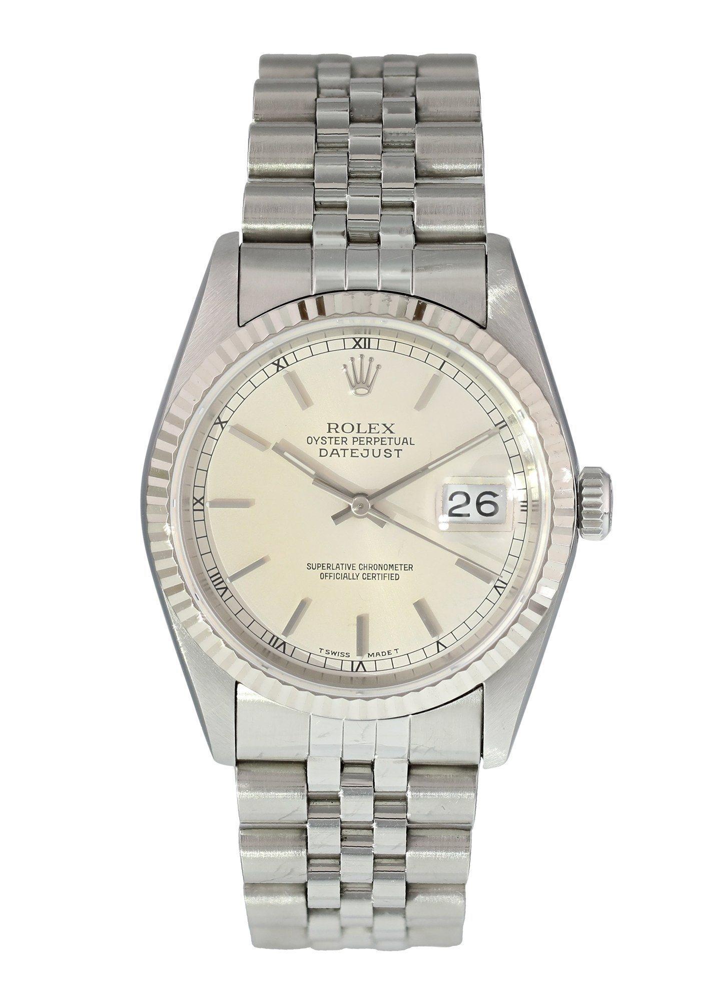 Rolex Oyster Perpetual Datejust 16014 Men's Watch
36mm Stainless Steel case. 
White Gold Stationary bezel. 
Silver dial with Luminous Steel hands and index hour markers. 
Minute markers on the outer dial. 
Date display at the 3 o'clock position.