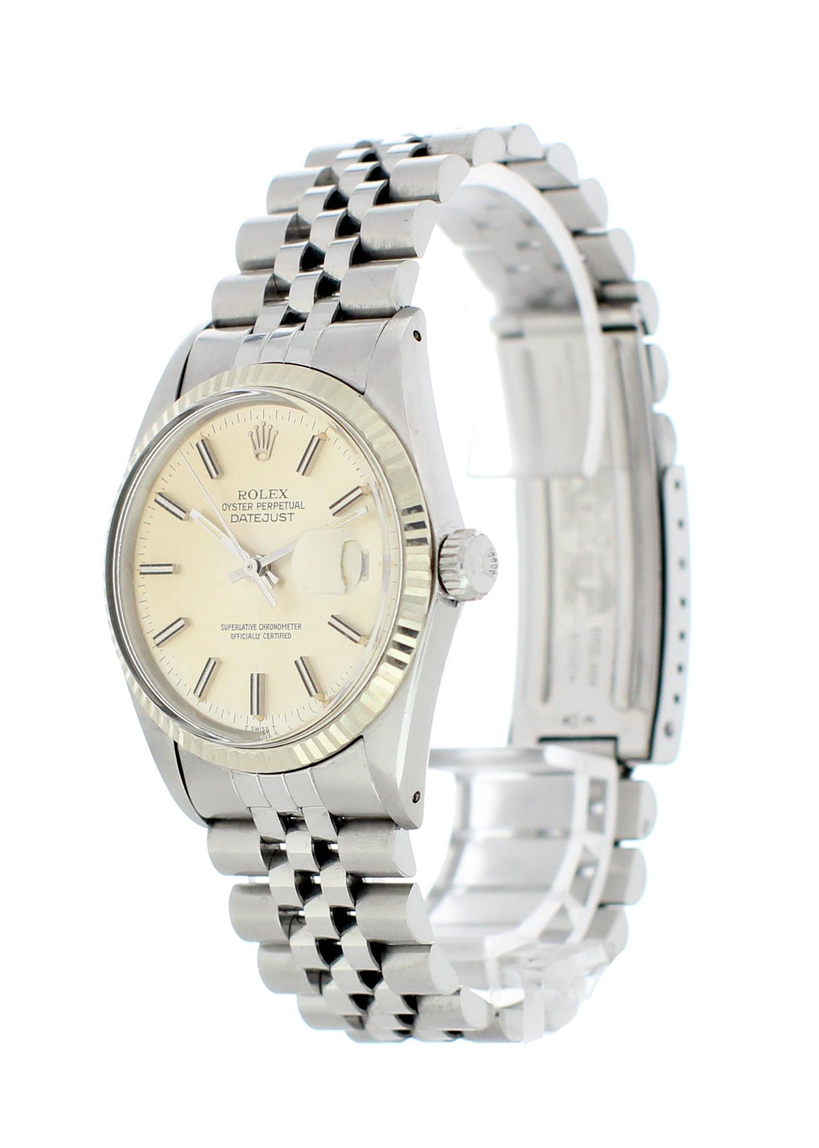 Rolex Oyster Perpetual Datejust 16014 Men's Watch. Stainless steel 36mm case. 18k white gold bezel. Silver dial with steel hands and markers. Date aperture with quickset function. Stainless steel jubilee band with fold over clasp. Will fit up to a