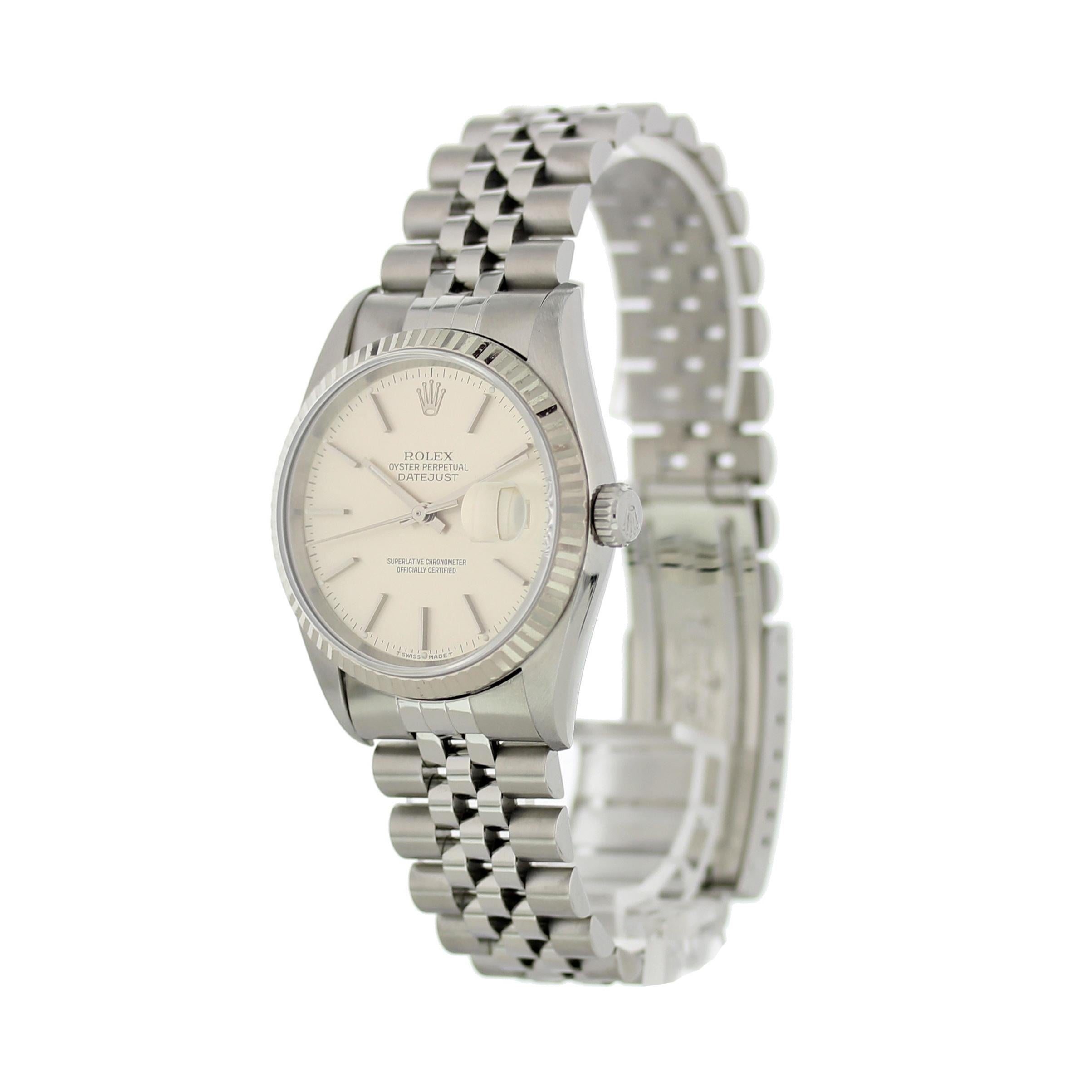 Rolex Oyster Perpetual Datejust 16234 Mens Watch.
36mm Stainless Steel case. 
White Gold Stationary bezel. 
Silver dial with Luminous Steel hands and index hour markers. 
Minute markers on the outer dial. 
Date display at the 3 o'clock position.