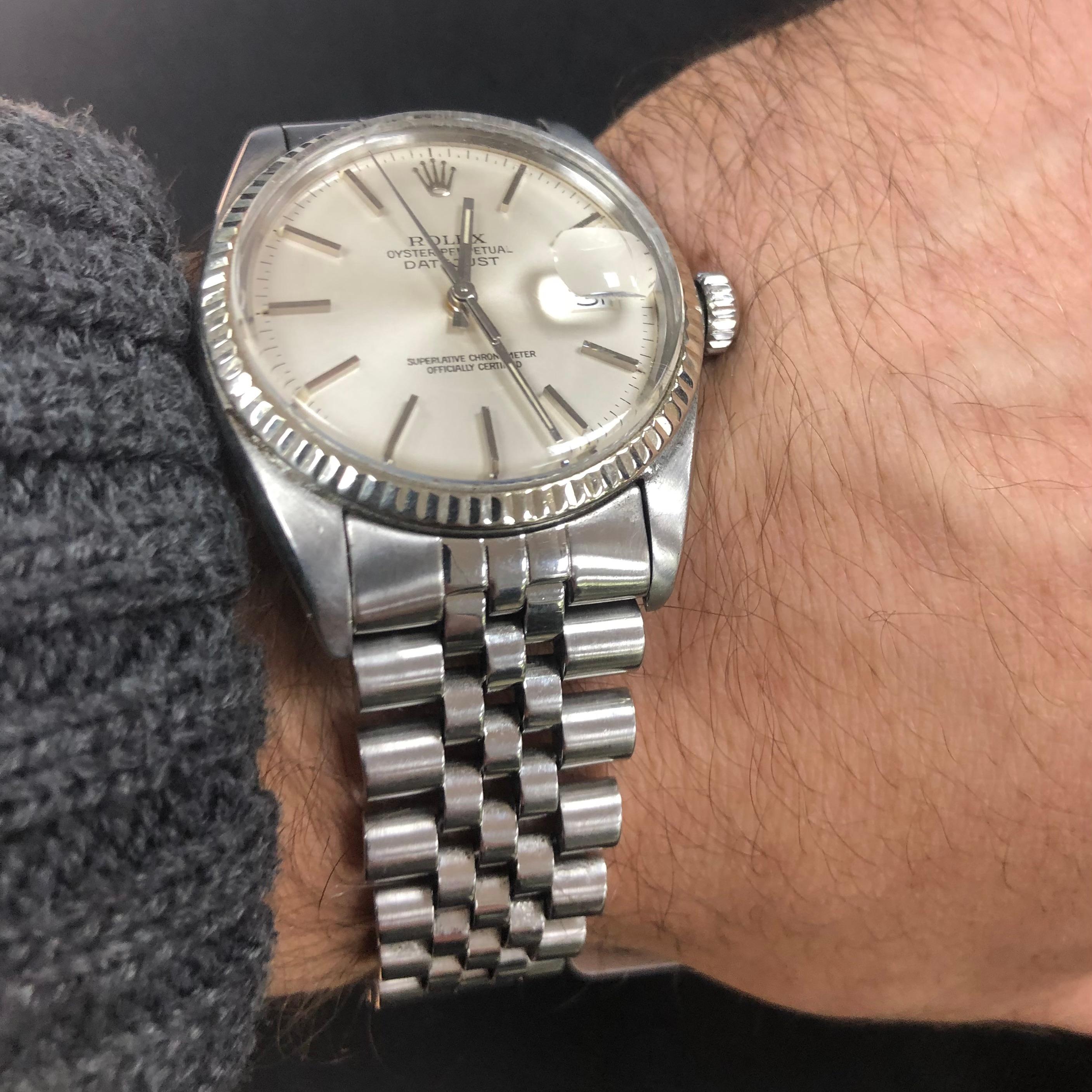 Rolex Oyster Perpetual DateJust 1603 36mm silver dial. The movement is an official certified chronometer self-winding automatic movement. 

This Rolex Oyster Perpetual DateJust 36mm 1603 timepiece features a stainless steel jubilee Bracelet with a