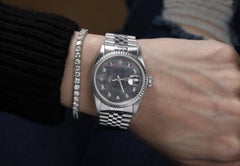 Rolex Oyster Perpetual Datejust Black Mother of Pearl Dial with Diamonds 16030